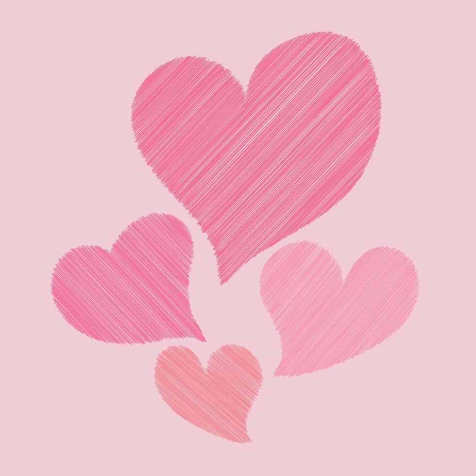 Cute Hearts 桌布 壁紙 — 四個手繪粉紅色心形，帶有塗鴉紋理，輕輕漂浮在柔和的粉紅色背景上。