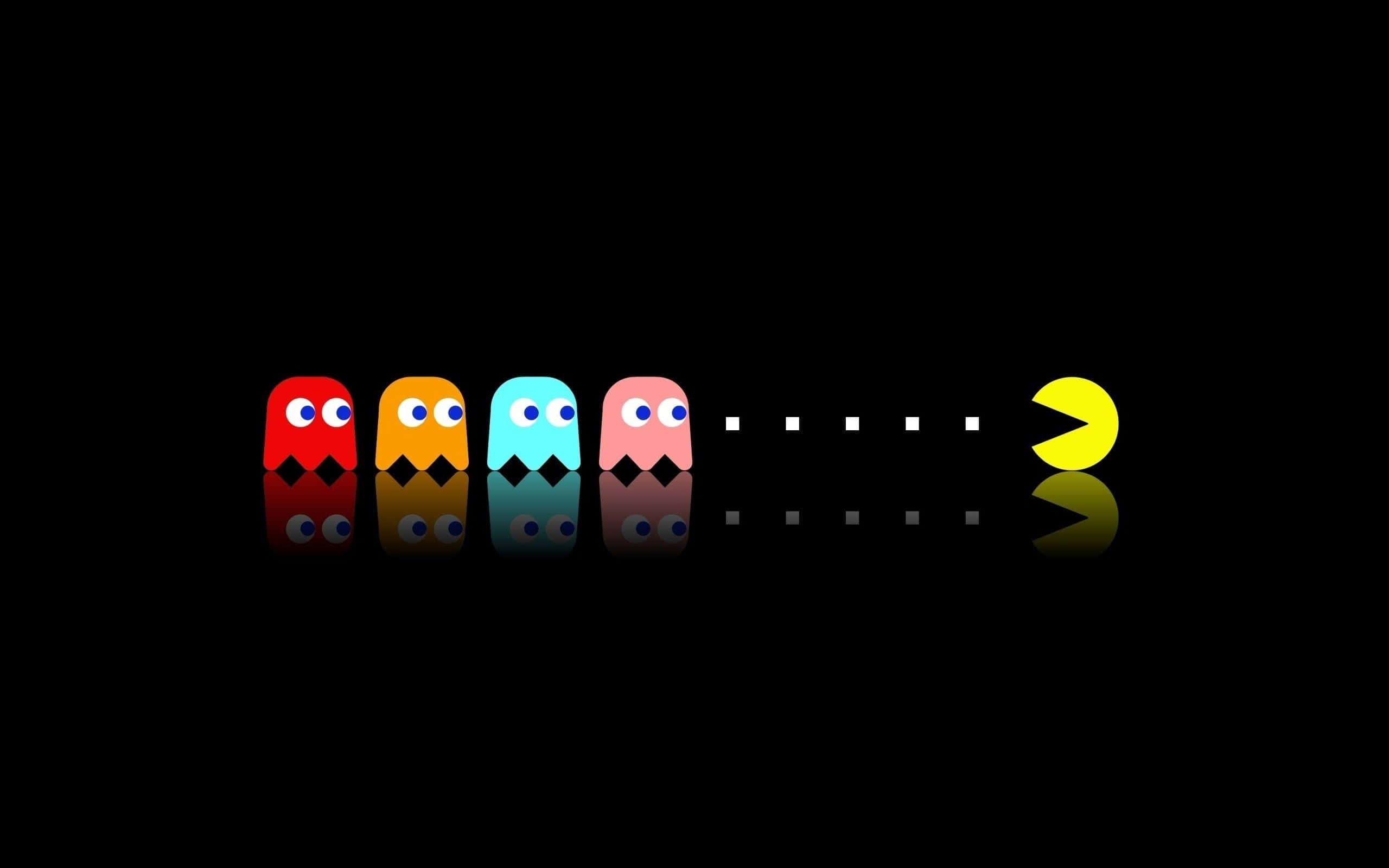 Minimalist Game 桌布 壁紙 — 四個色彩繽紛的 Pac-Man 鬼魂排成一排，面向一個黃色的 Pac-Man，位於黑色反光表面上。