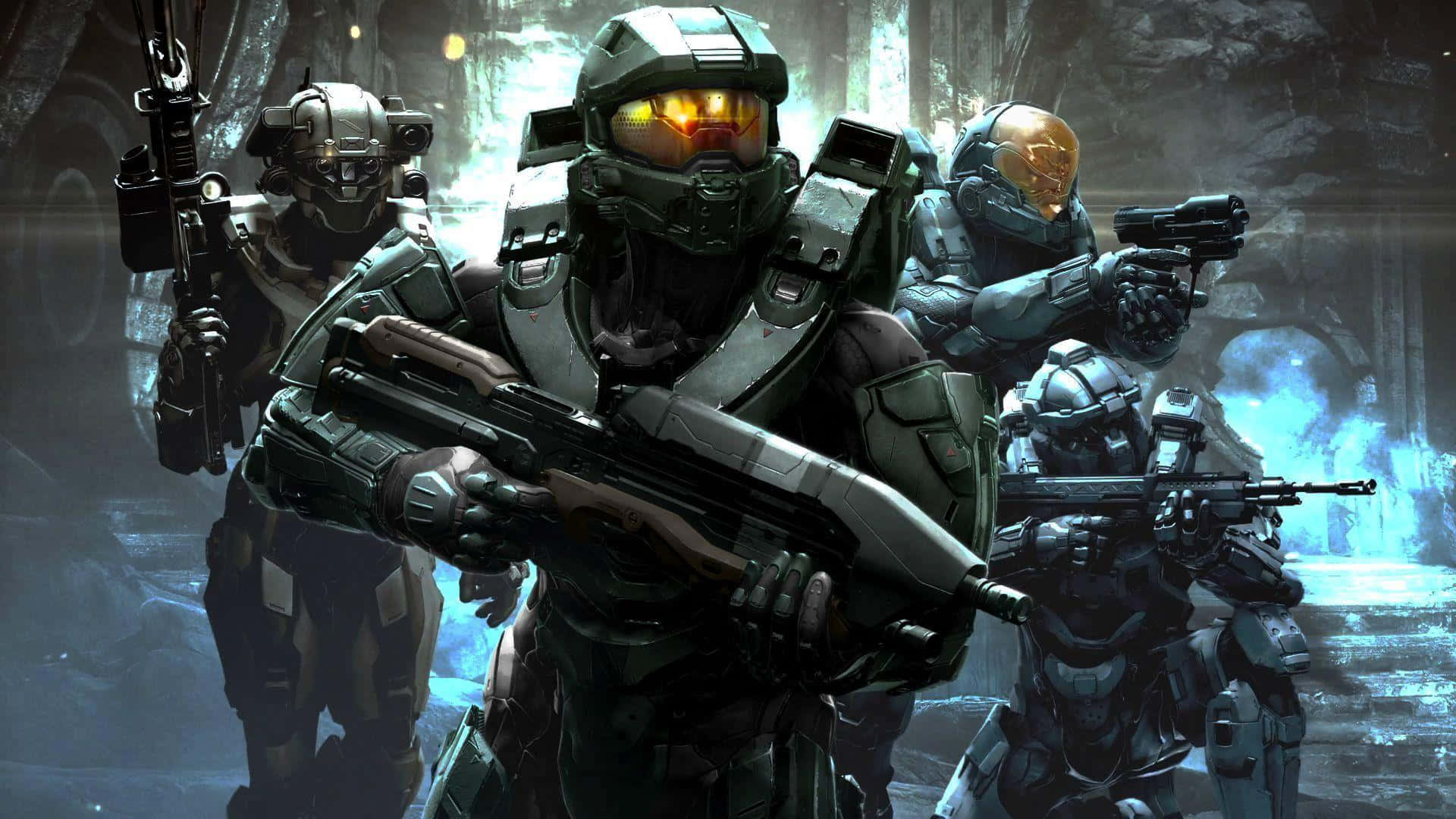 Halo Spartans 桌布 壁紙 — 四名身穿未來裝備的裝甲士兵在光線昏暗、冰冷的異星遺跡中手持武器準備就緒。