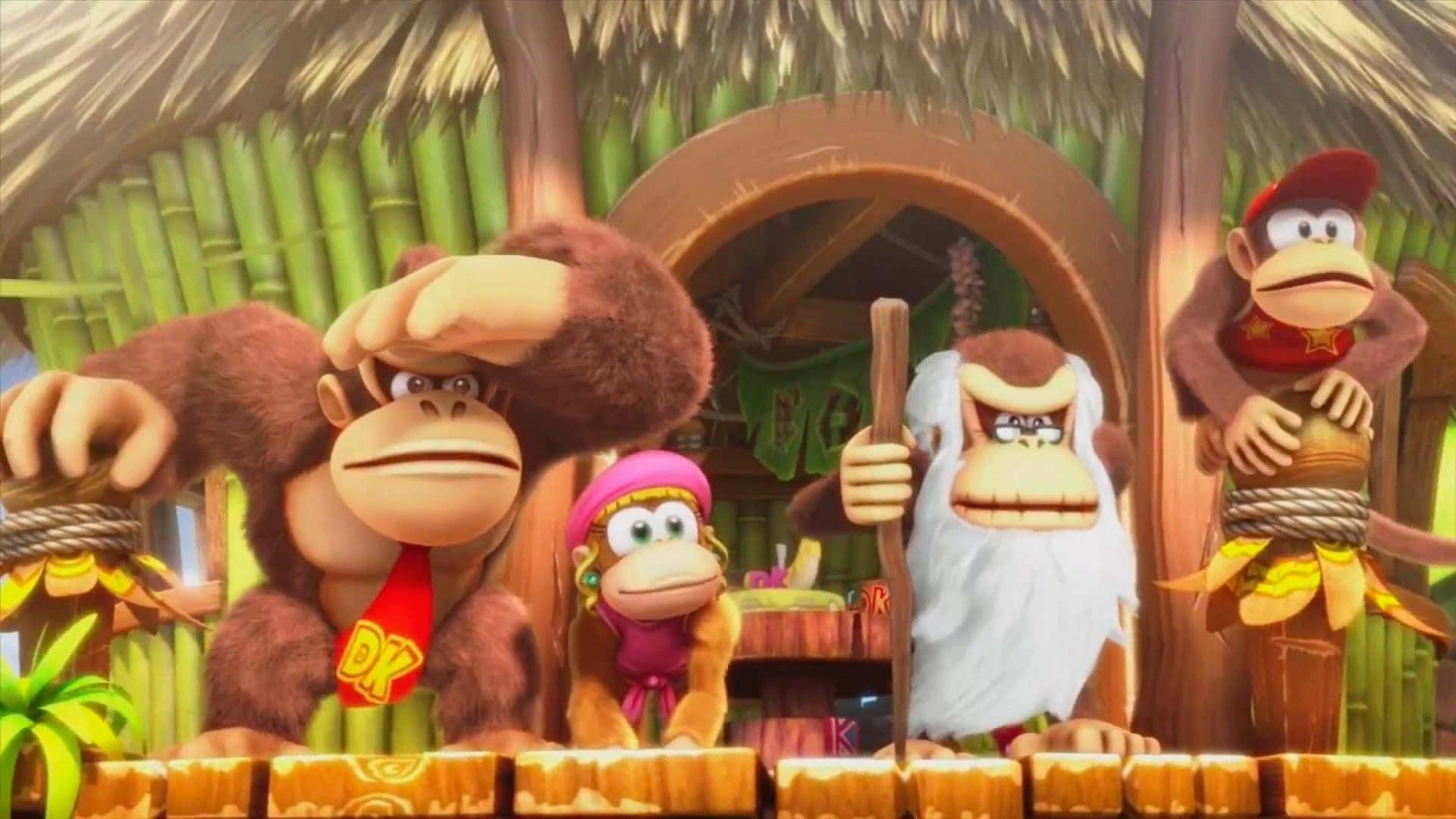 Diddy Kong 桌布 壁紙 — 四隻動畫猴子在竹棚屋內，有茅草屋頂和木柵欄。