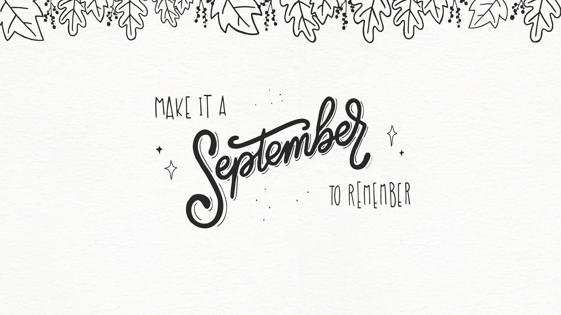 手寫字句 Make It A September To Remember 以秋葉框住。