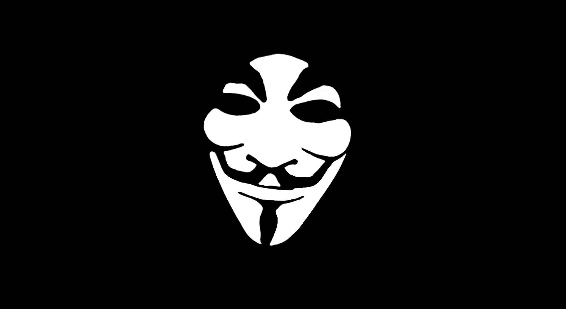 團結即是力量 壁紙 — 一個鮮明的白色蓋伊·福克斯面具，居中在純黑色背景上，對比度高。