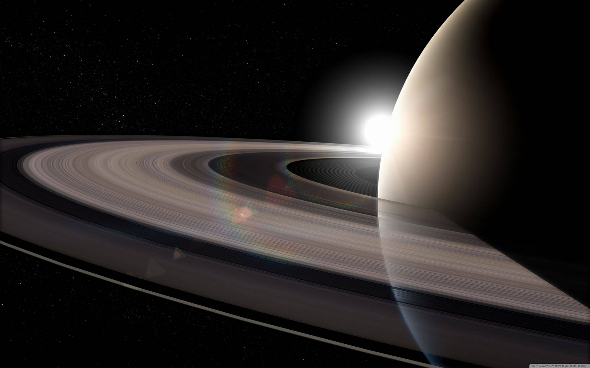 土星及其光環在深空中被陽光照射。 — 土星 壁紙