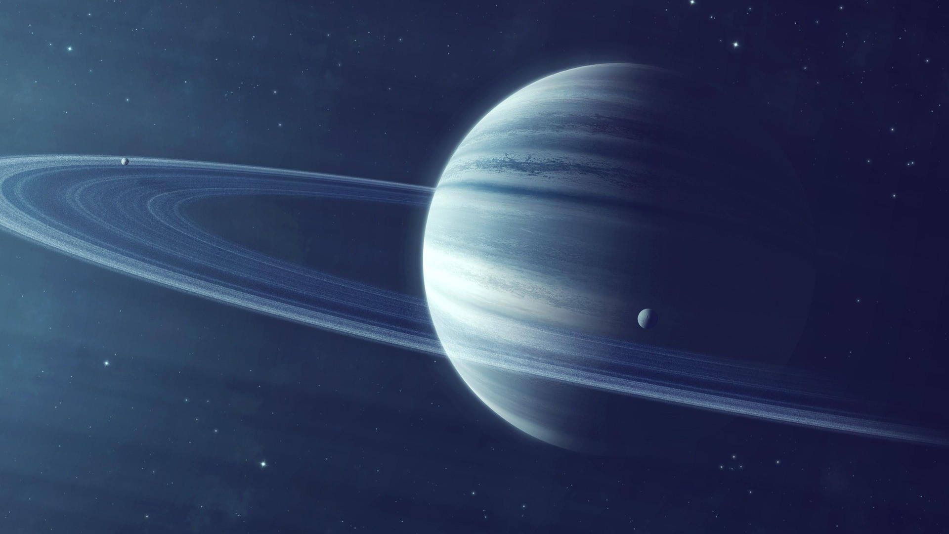 一顆藍色的氣態巨行星，帶有環和衛星，在星空場景中。 — 土星 壁紙