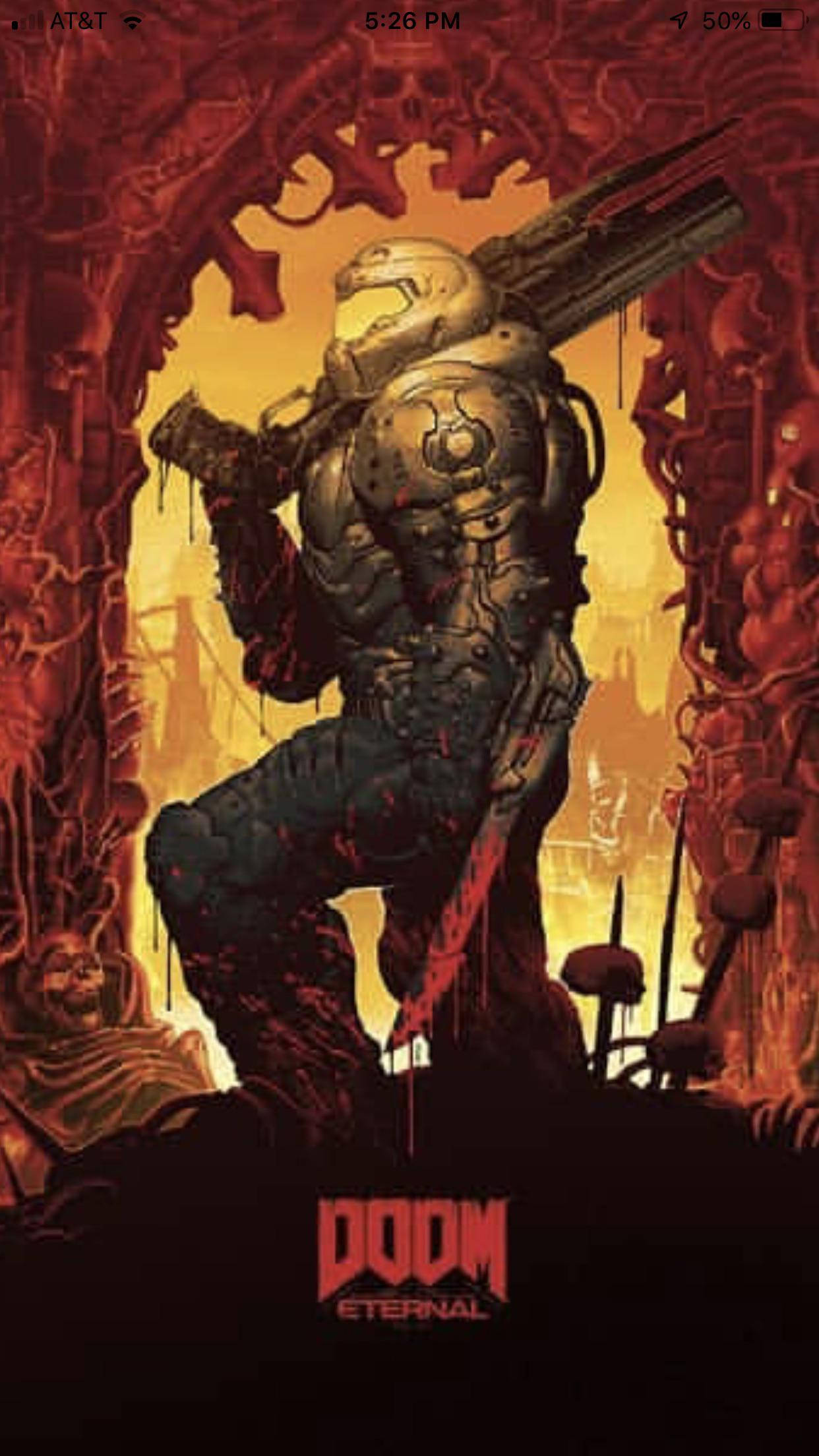 在《DOOM 永恆》中與DOOM Slayer一同殲滅敵人 壁紙 — 一名重裝甲太空陸戰隊員挑釁地站在地獄般的門口，手持巨大武器，背景是熊熊烈火。