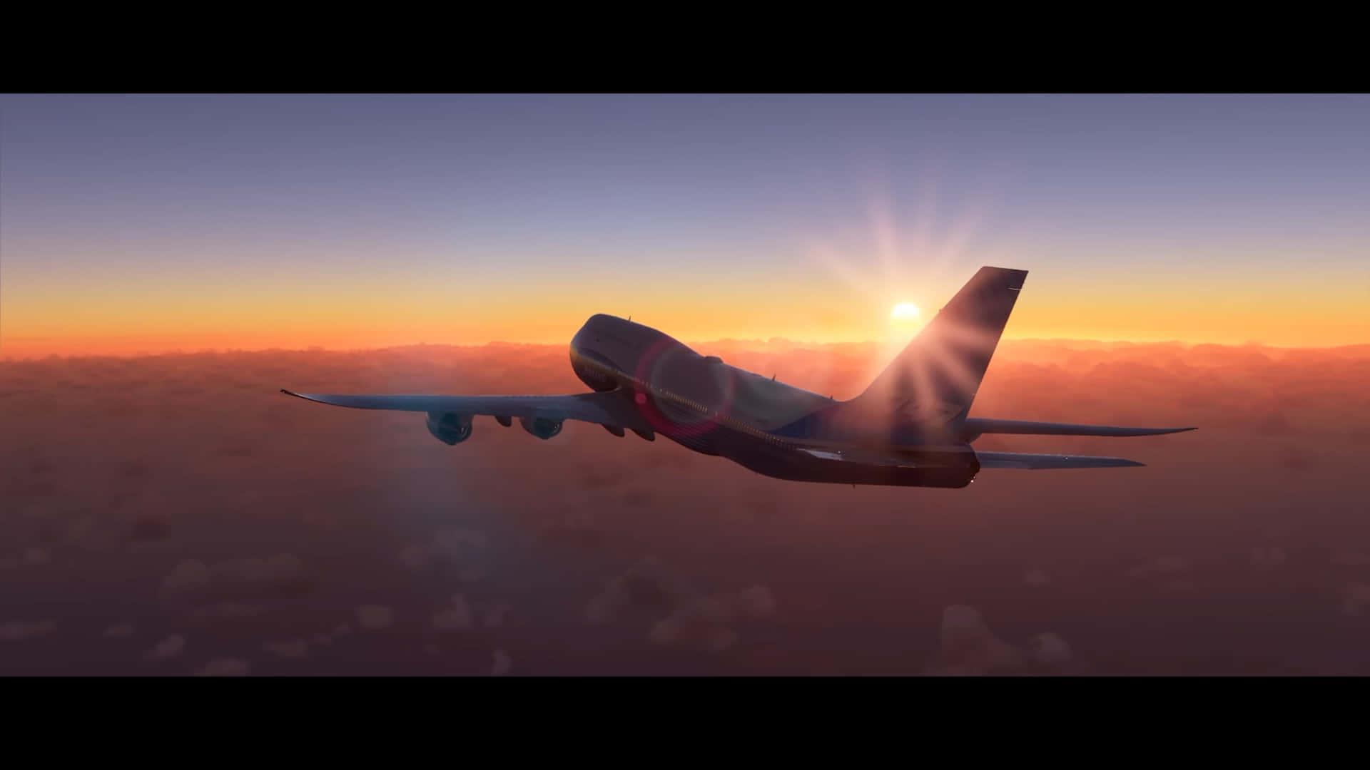 飛機在絢麗的日落中飛越雲層。