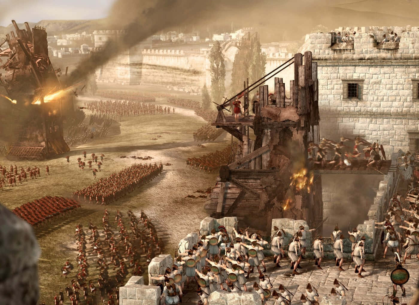 在《Total War Rome 2》中率領羅馬軍團獲勝 壁紙 — 古代士兵在混亂的攻城戰中交鋒，燃燒的攻城塔和煙霧在石牆上升起。
