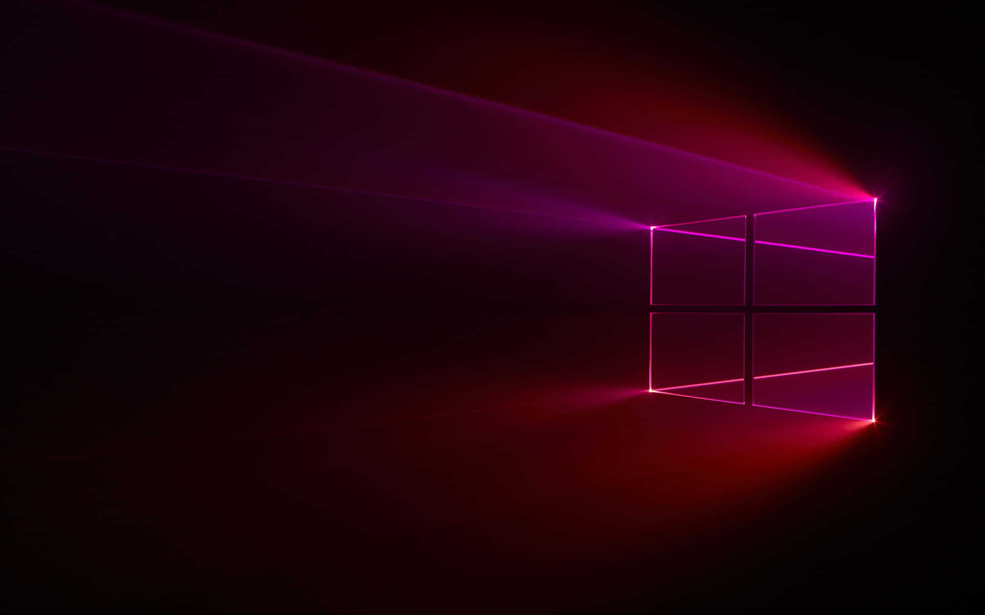 在黑暗空間中帶有霓虹粉紅和紫色光線的發光Windows標誌。
