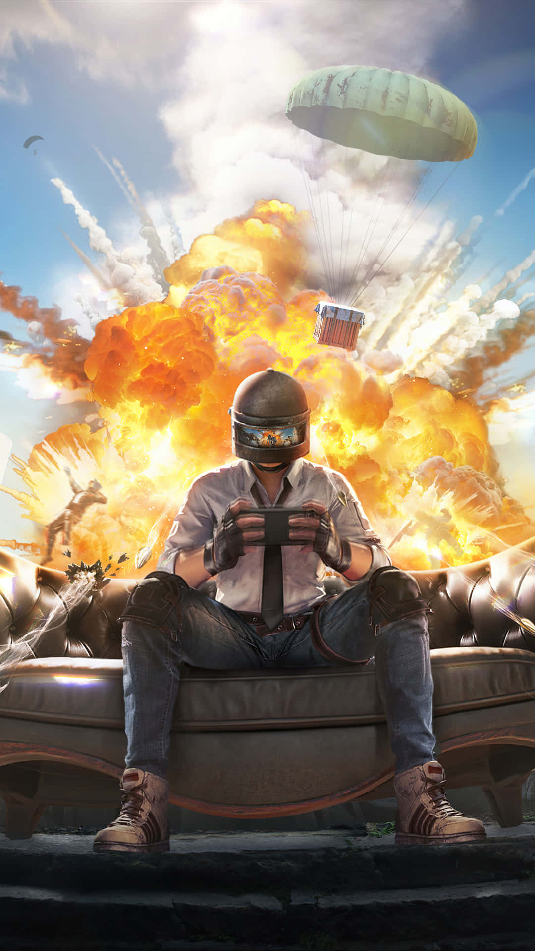 戴頭盔的遊戲玩家在爆炸和降落傘在身後爆發時玩手機遊戲。