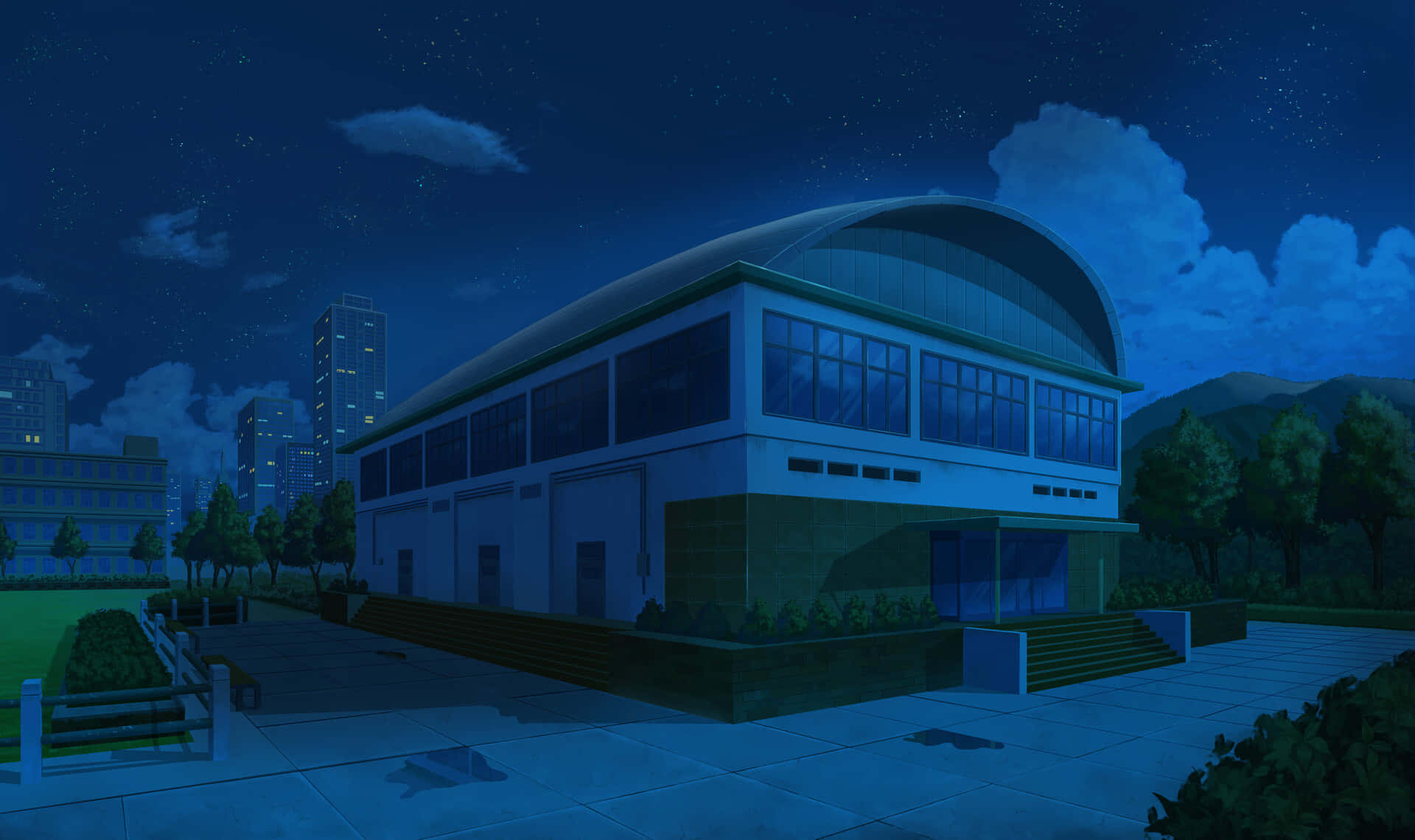 星空下現代建築與城市和山脈