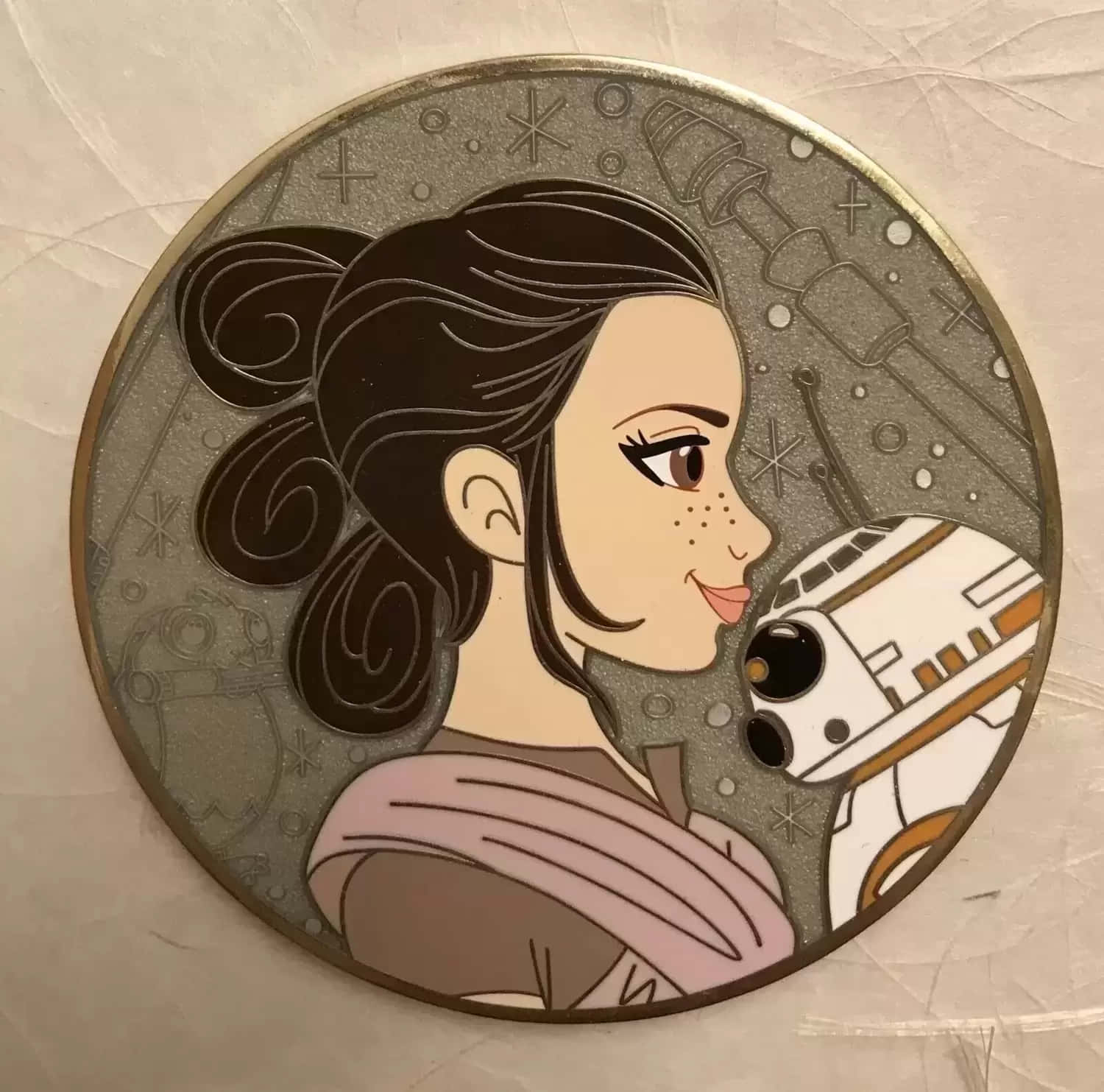 莉亞公主和BB-8在圓形星際大戰插圖徽章中。