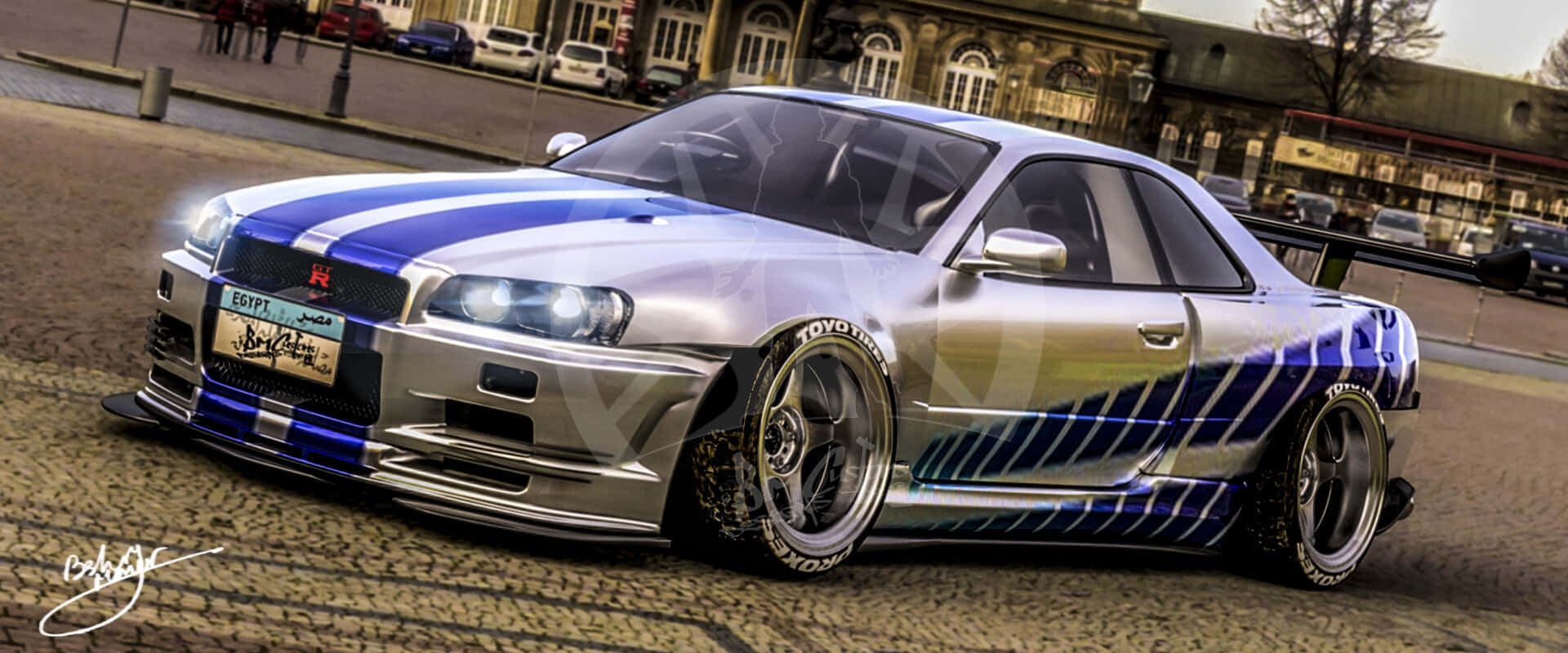 自訂銀色和藍色的日產Skyline R34漂移車停在鵝卵石街道上。
