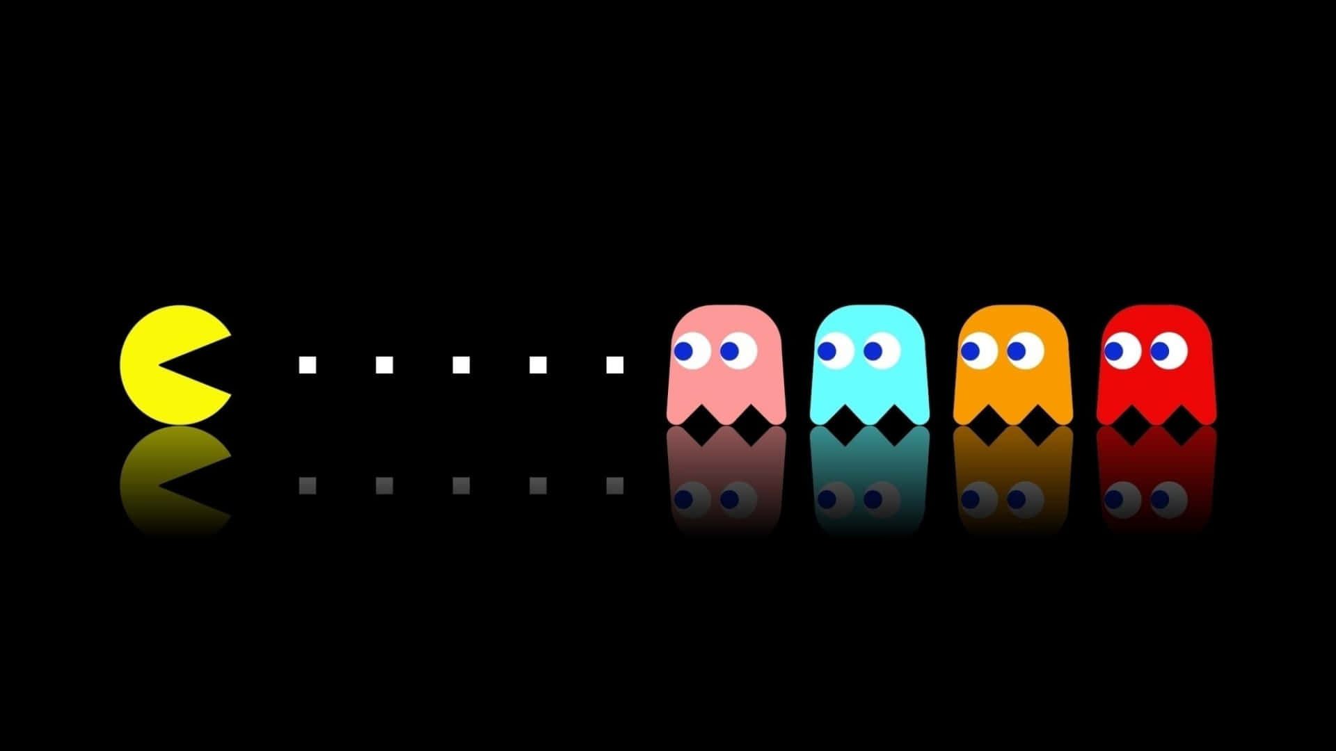 Pacman 與四個鬼魂在黑色反光表面上互相對峙。