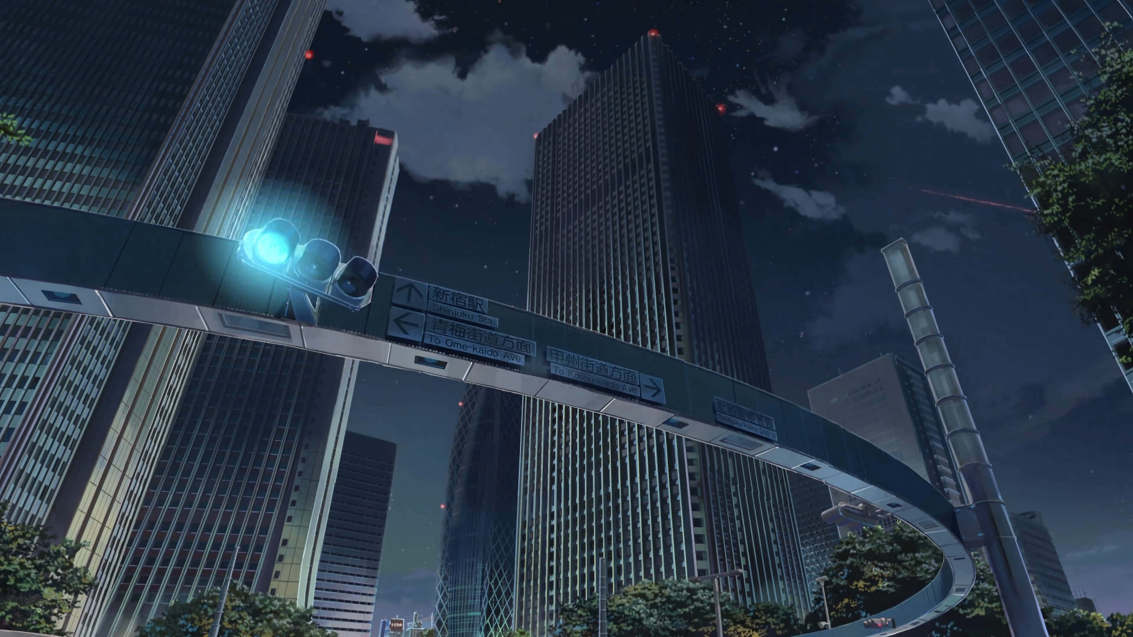 Makoto Shinkai 桌布 壁紙 — 在星空下，一個發光的藍色交通燈懸掛在彎曲的高架橋上，周圍是高聳的摩天大樓。