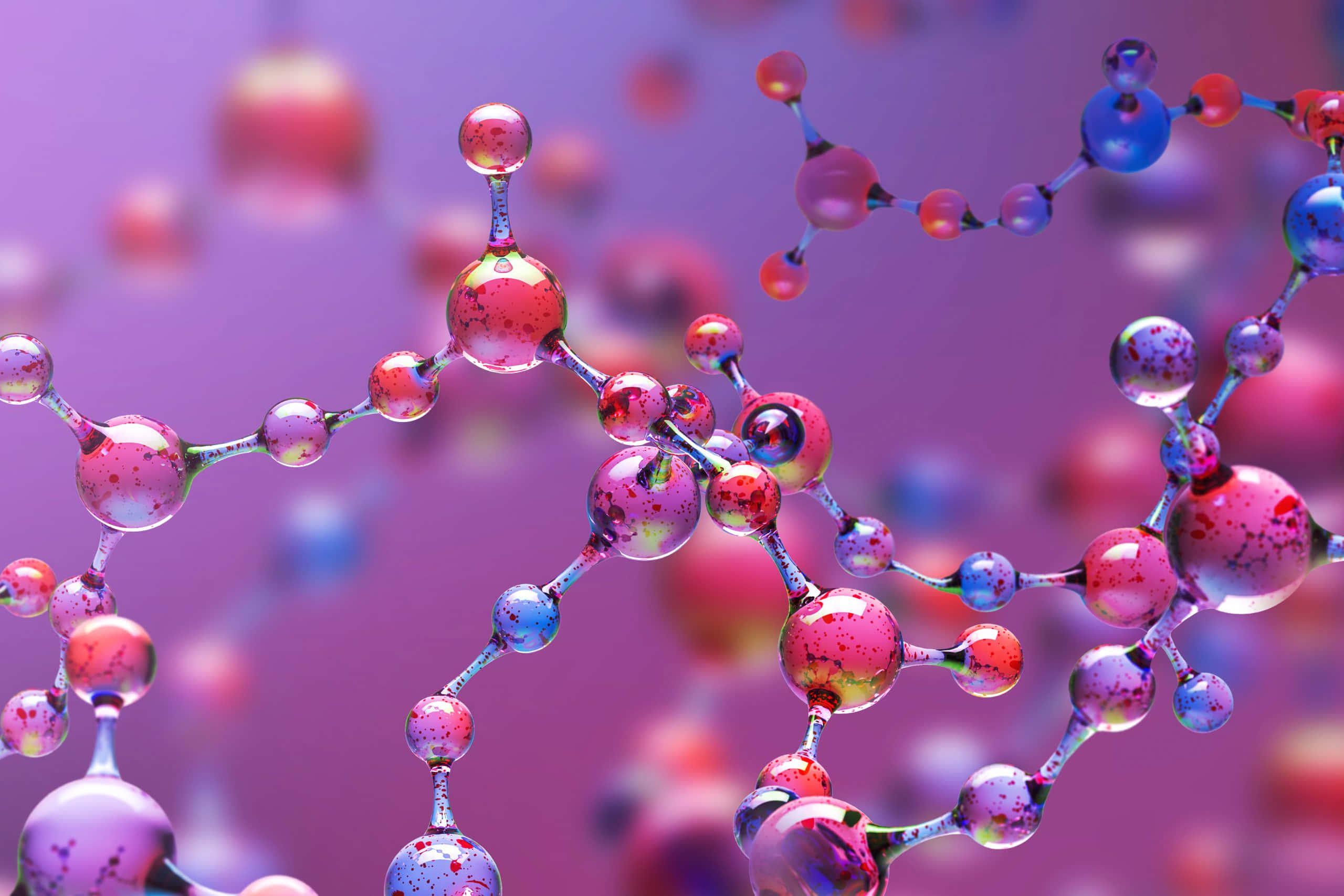 Chemistry 桌布 壁紙 — 在柔和紫色背景上，由棒連接的粉紅色和藍色球體組成的鮮豔分子結構。
