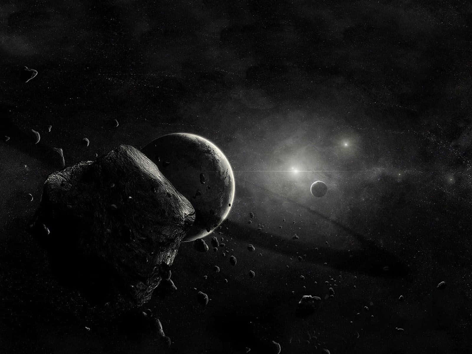 一個黑暗的太空場景，小行星和行星被遠處的星星照亮。