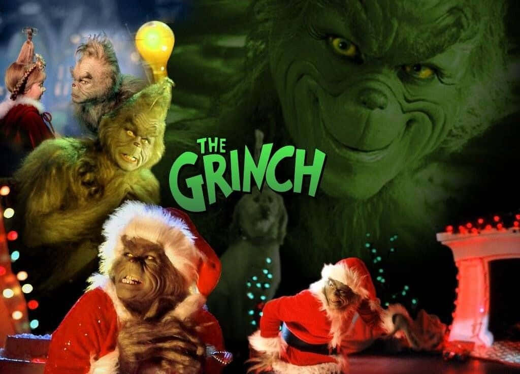 The Grinch 桌布 壁紙 — 在深綠色主題場景中，穿著節日紅色服裝、帶有發光燈光和節日裝飾的鬼靈精角色。