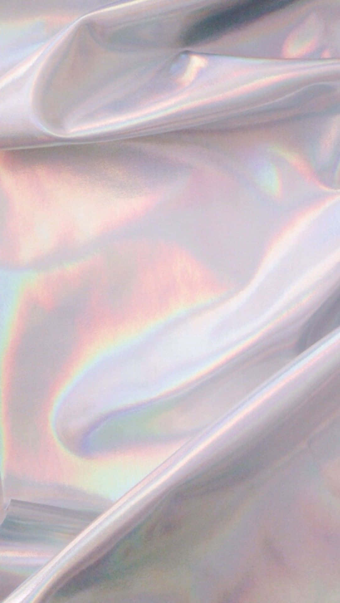 Marble iPhone 桌布 壁紙 — 在漫射光下，皺褶虹彩布料反射柔和粉彩彩虹色調的特寫。