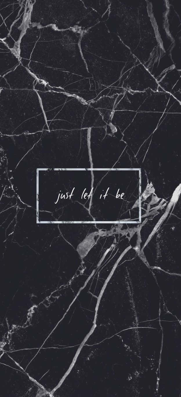 黑色大理石背景，帶有白色紋理同文字框，寫住 just let it be。