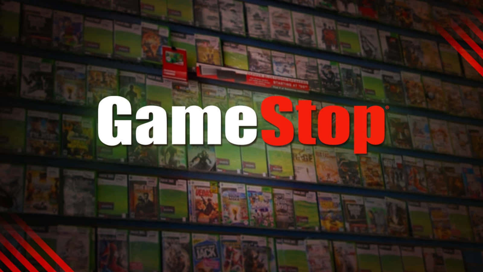 在當地GameStop提升您的遊戲體驗！ 壁紙 — GameStop 標誌以粗體白色和紅色字母居中顯示在昏暗商店中裝滿彩色電玩遊戲盒的貨架上。