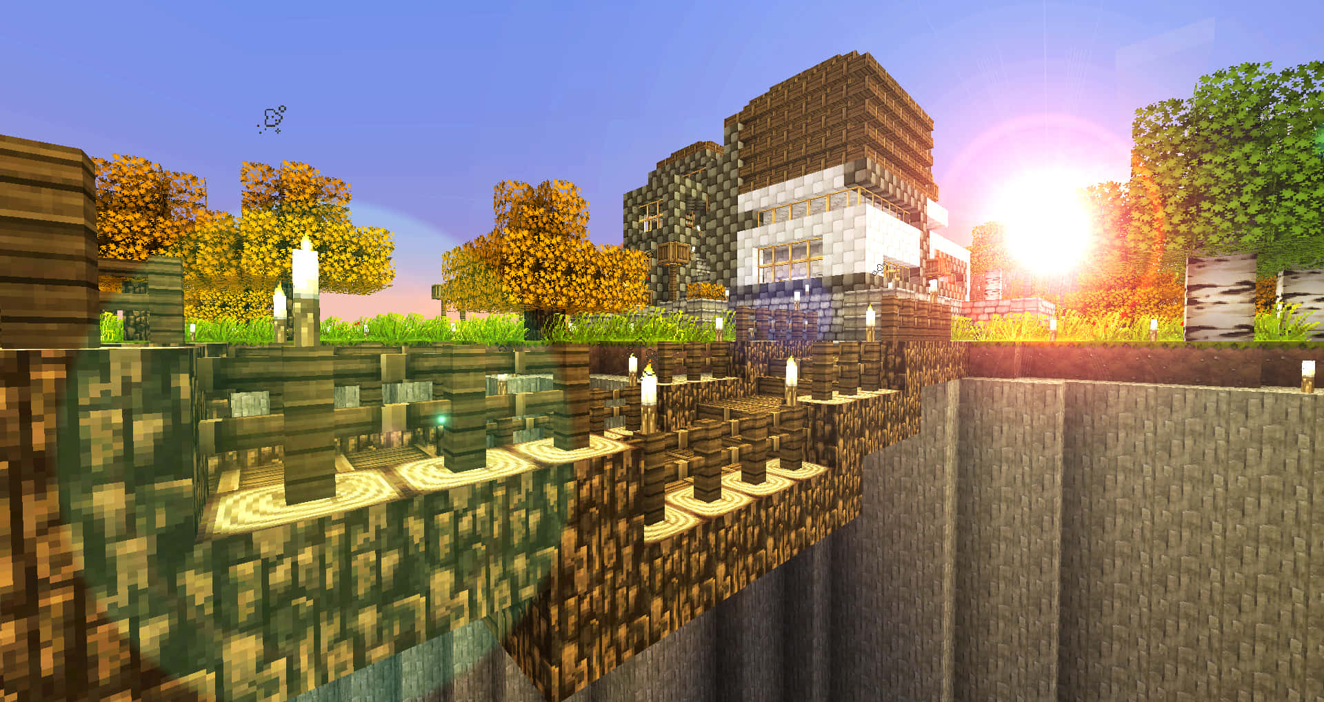 夕陽下懸崖邊的Minecraft村莊，閃爍的燈籠和秋樹。