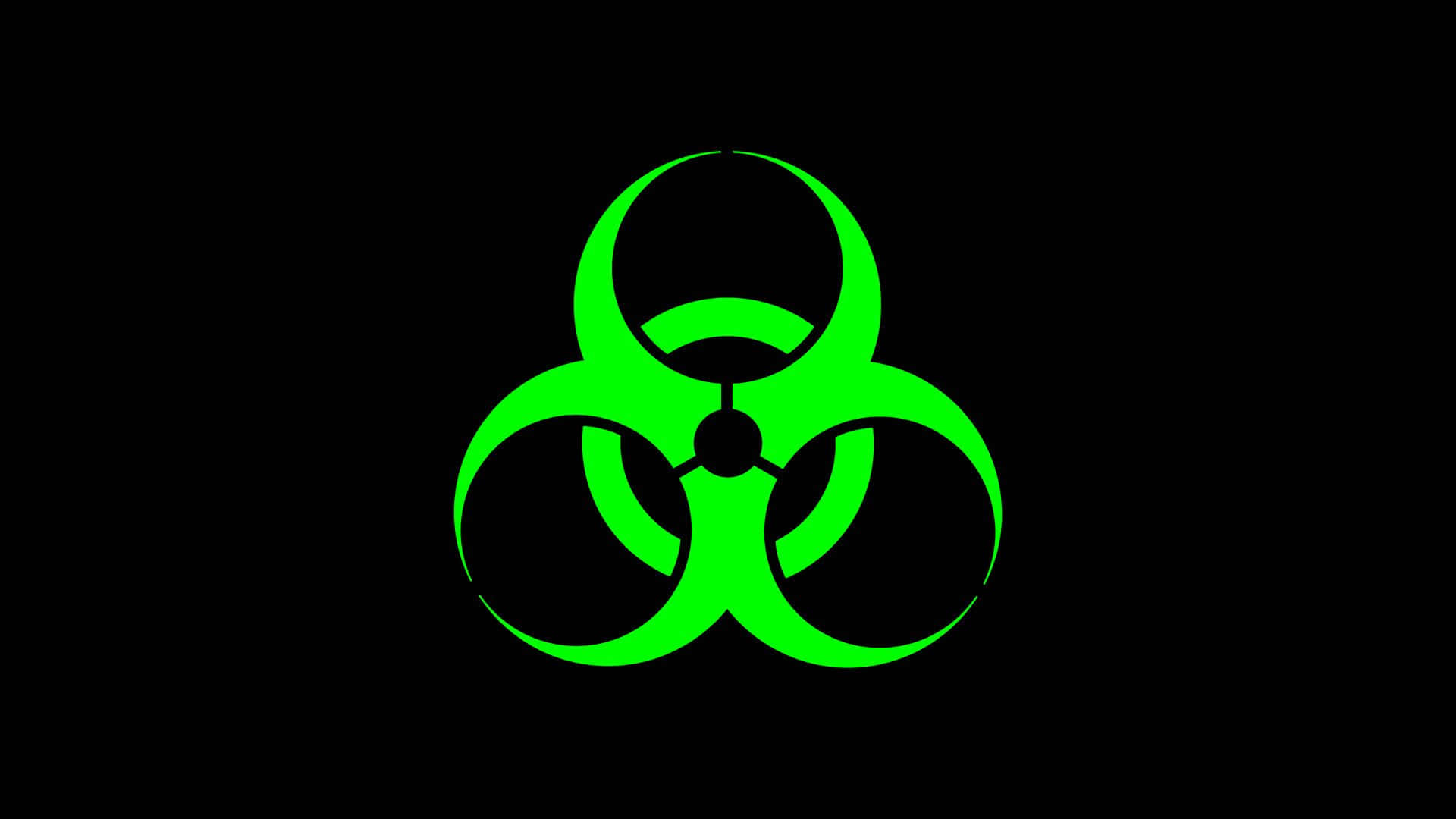 toxic 桌布 壁紙 — 在純黑背景中央的發光綠色生物危害標誌。