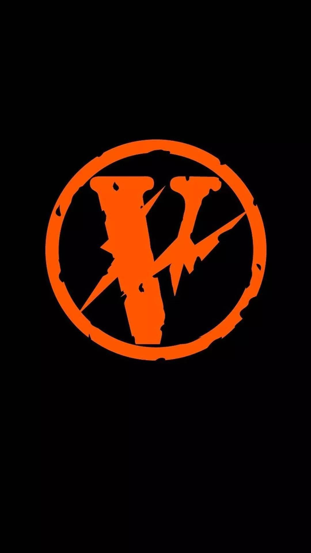Vlone 桌布 壁紙 — 在純黑色背景上，一個粗糙圓圈內的醒目橙色風格化V標誌。