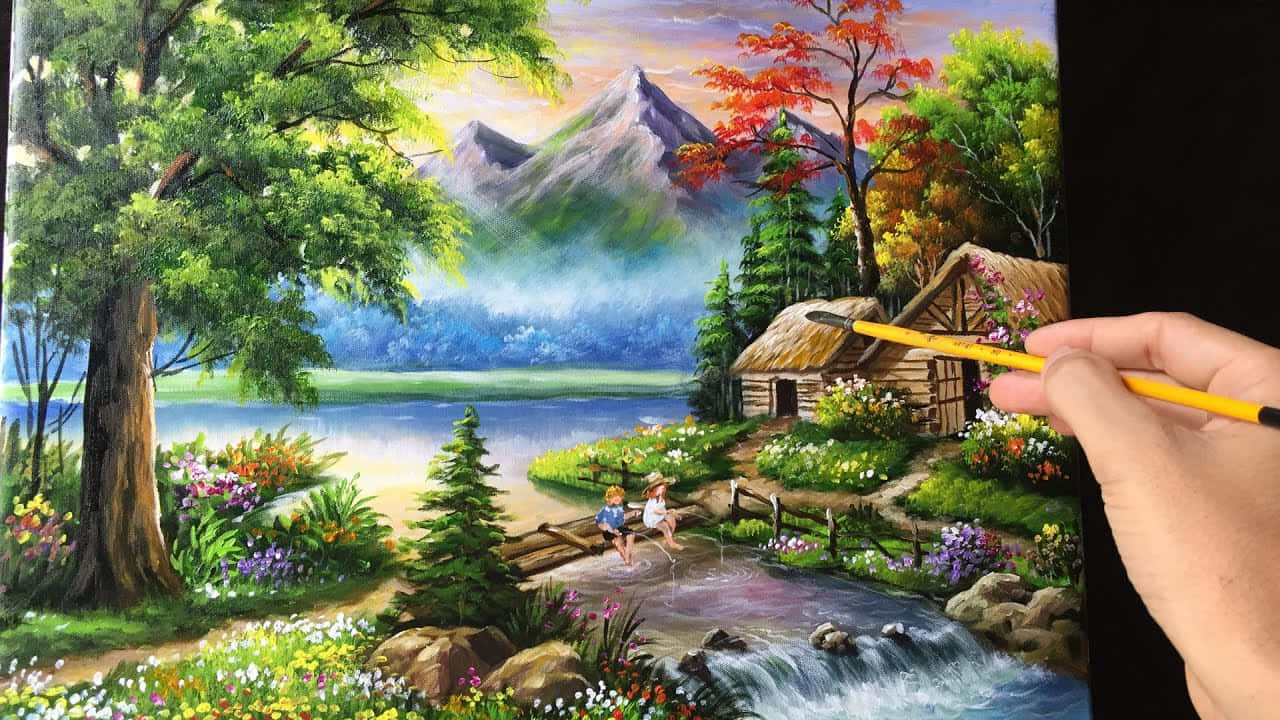在美麗藝術中尋找靈感 壁紙 — 一隻手正在繪製一幅充滿活力的風景畫，畫中有河邊小屋，周圍環繞著秋樹和遠山。