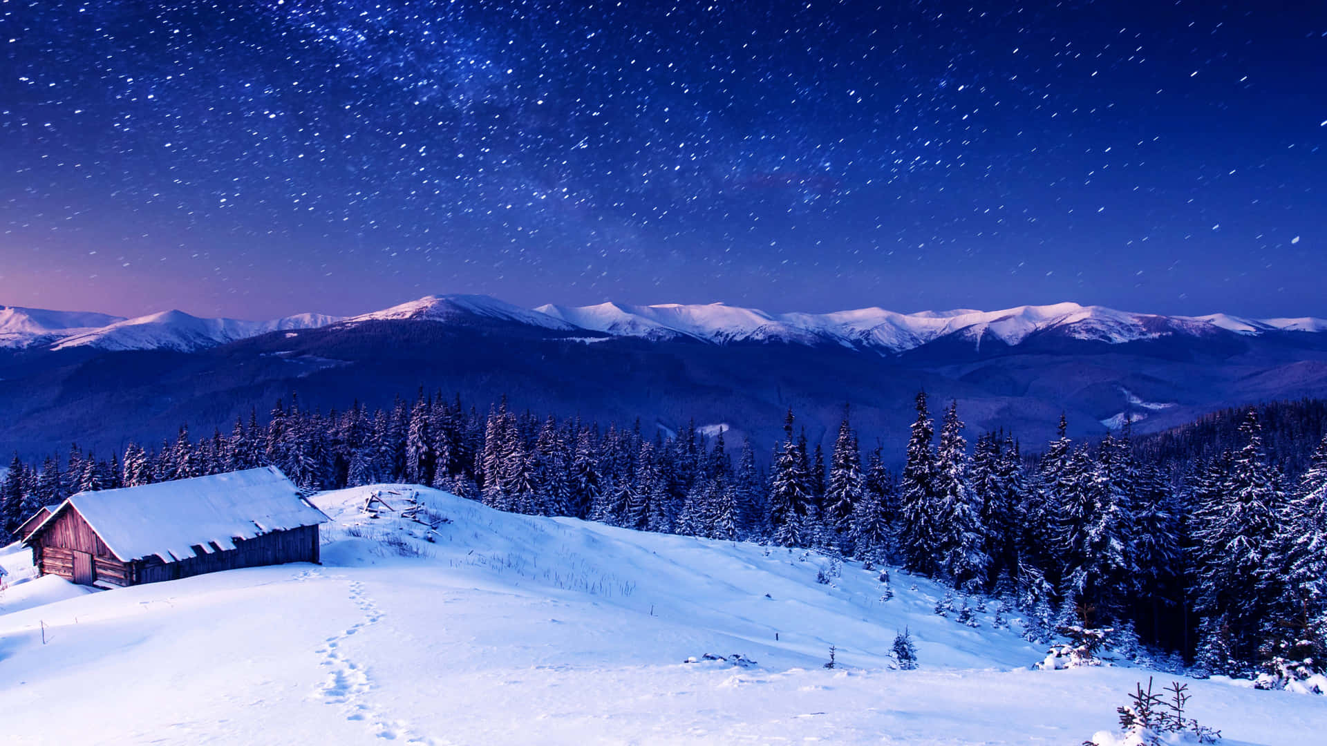 冬季森林中的雪屋，星空下，遠山積雪
