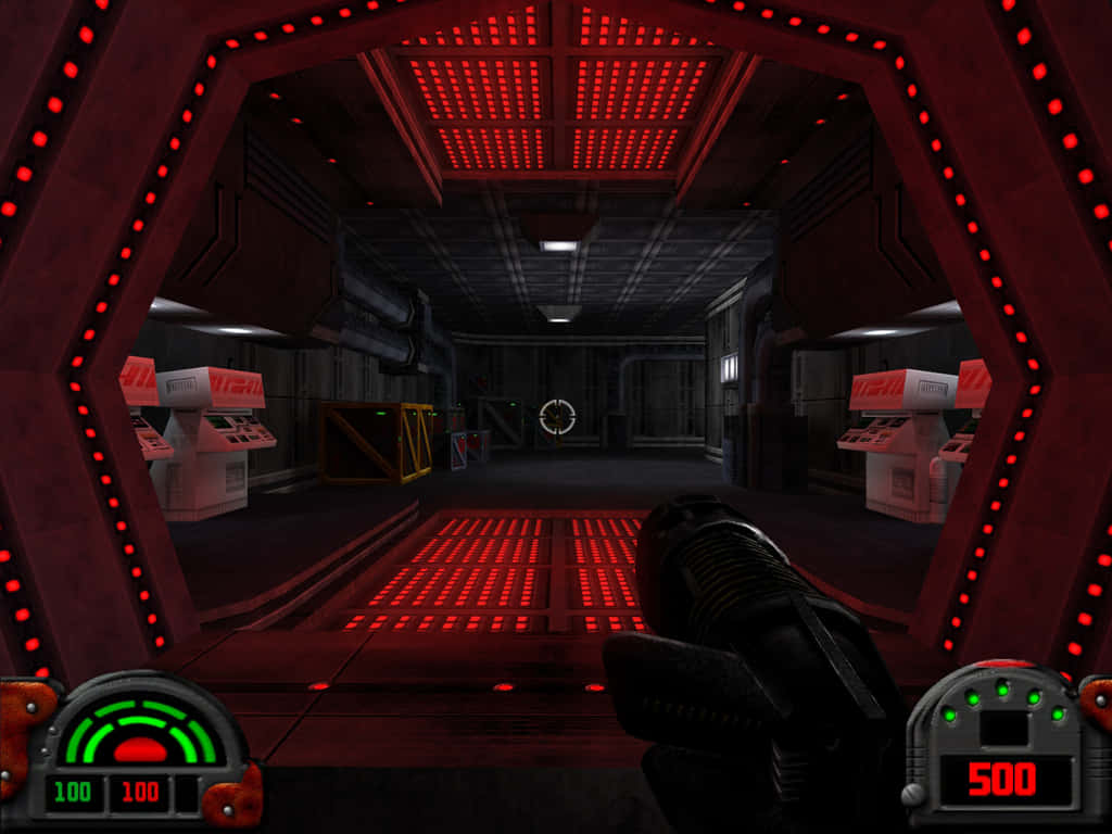 Dark Forces 桌布 壁紙 — 在黑暗科幻走廊中，紅色發光面板和管道照亮，手持武器的第一人稱視角。