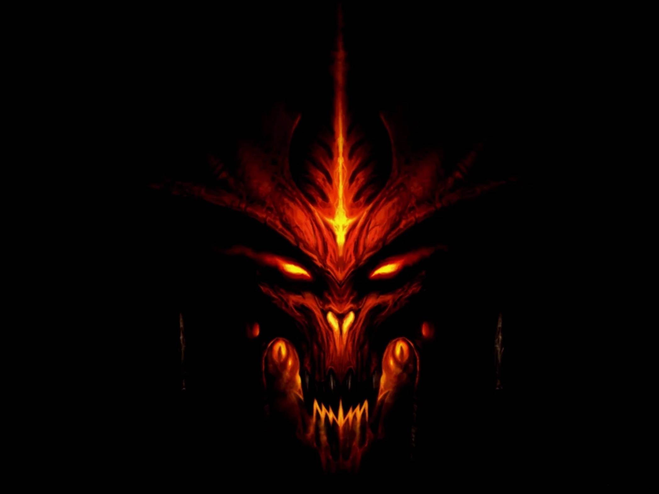 地獄之子酷炫頭像 壁紙 — 一個兇惡的惡魔面孔在漆黑的背景上發出火熱的橙色和紅色光芒。