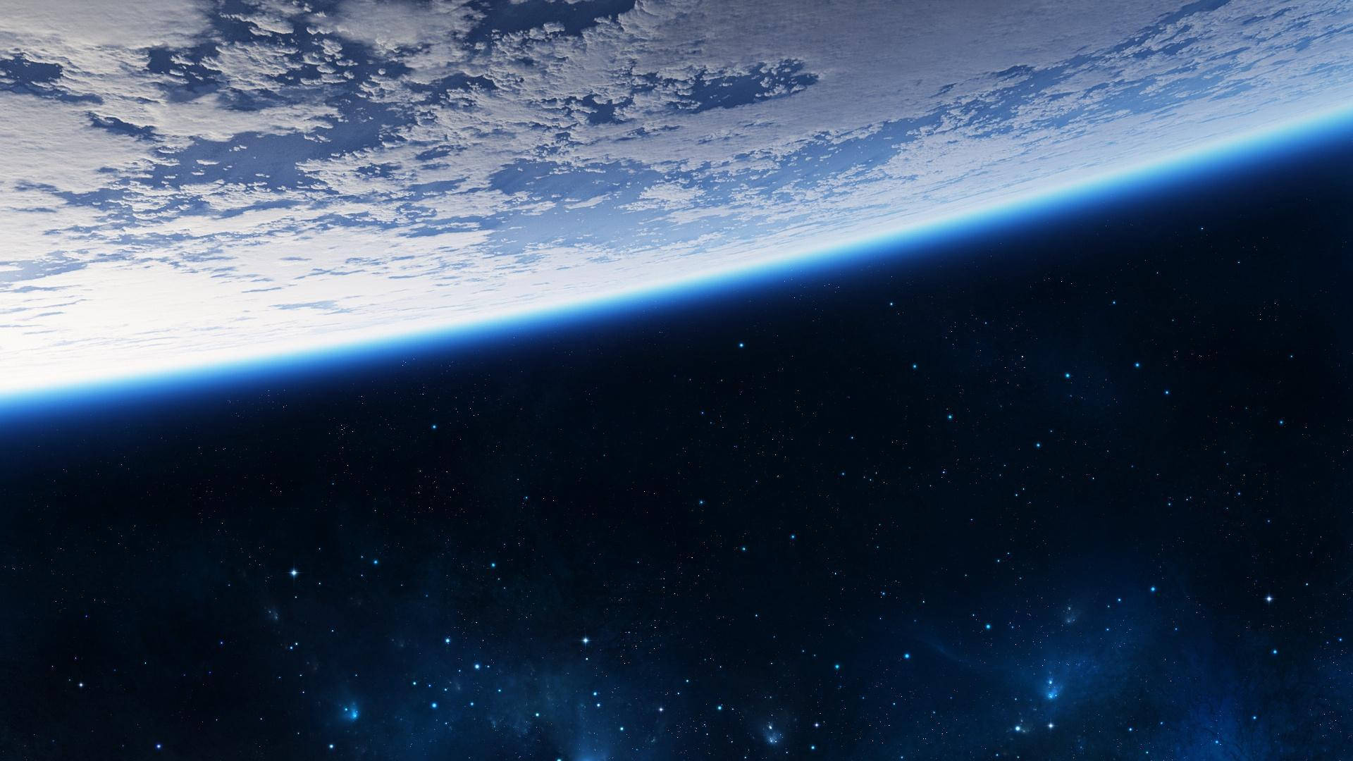 Full HD Tablet Galaxy 壁紙 — 地球彎曲的地平線在太空的星空中閃耀著一條幼細的藍線，上方有散落的雲層。