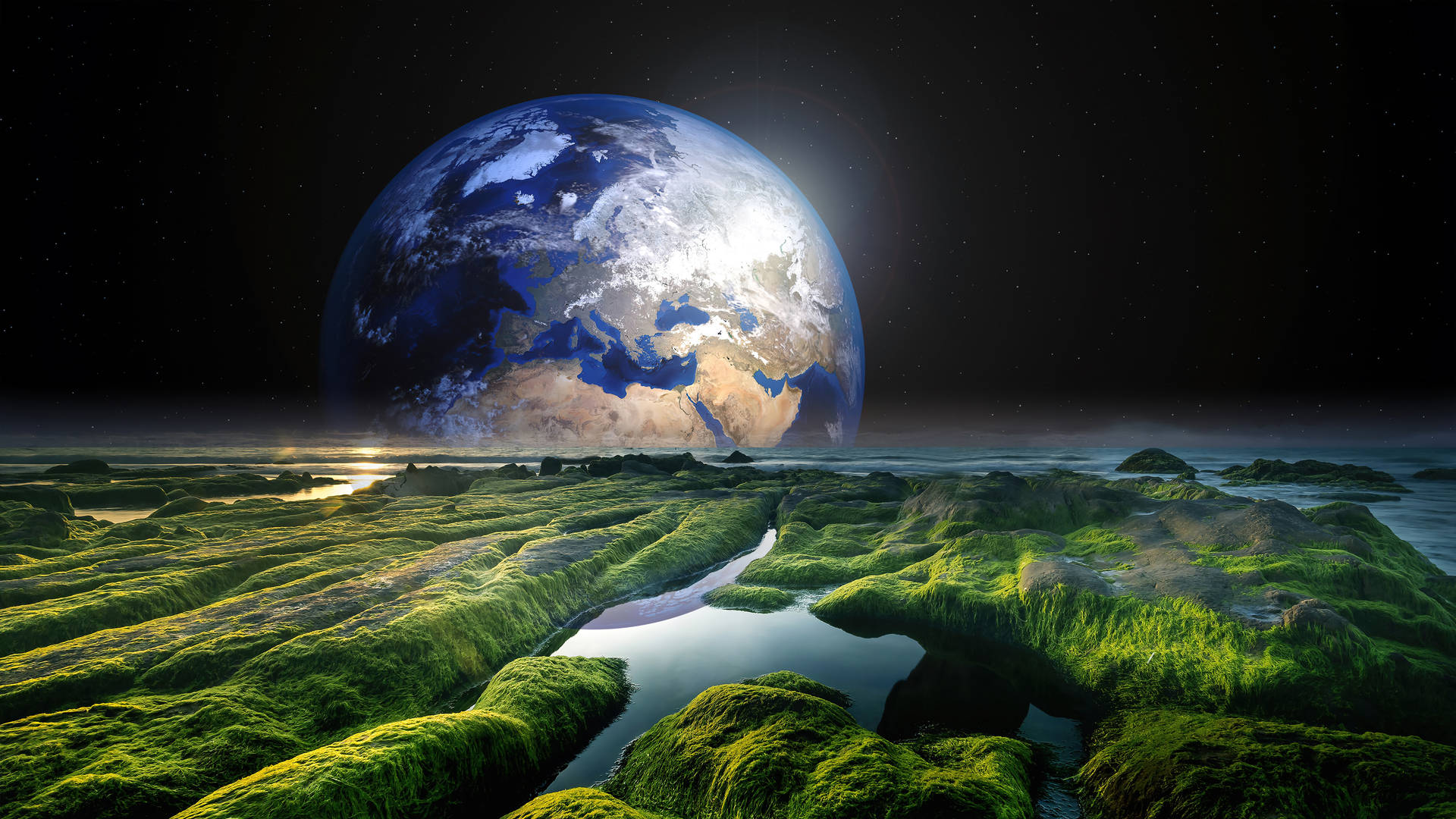 夜間太空中巨大地球下的苔蘚地形和河流。