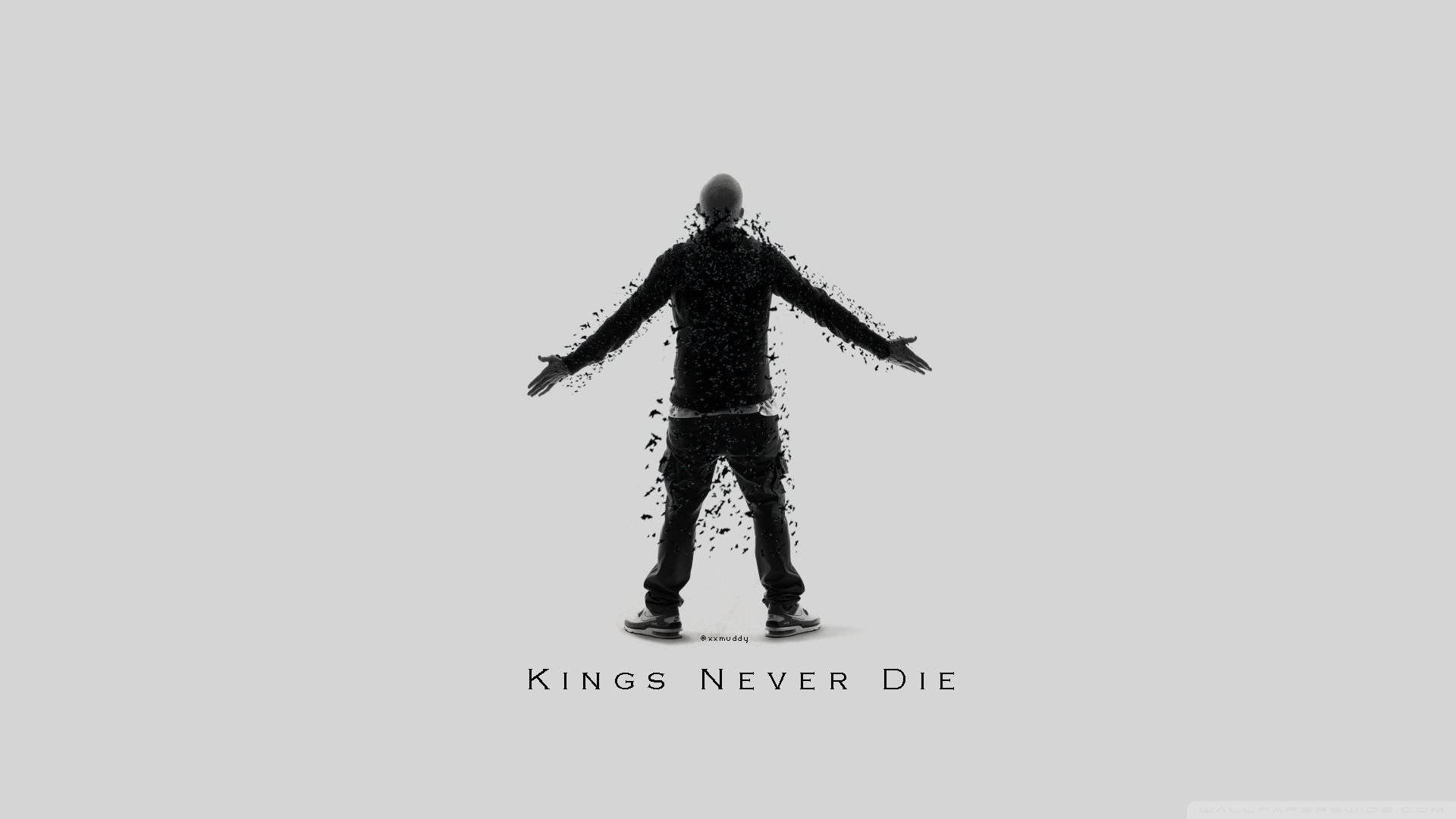 一個男人分解成粒子，帶有文字 kings never die