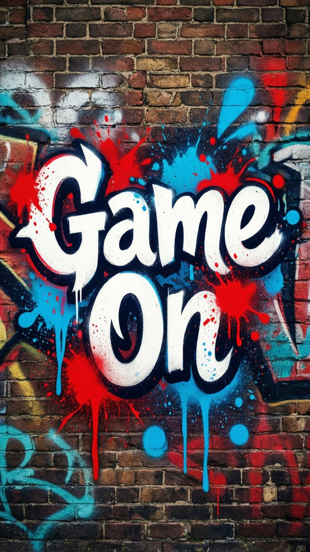 城市塗鴉遊戲開始 壁紙 — 粗體塗鴉字母拼出 Game On，在風化的磚牆上濺開，帶有鮮豔的紅色和藍色油漆滴。