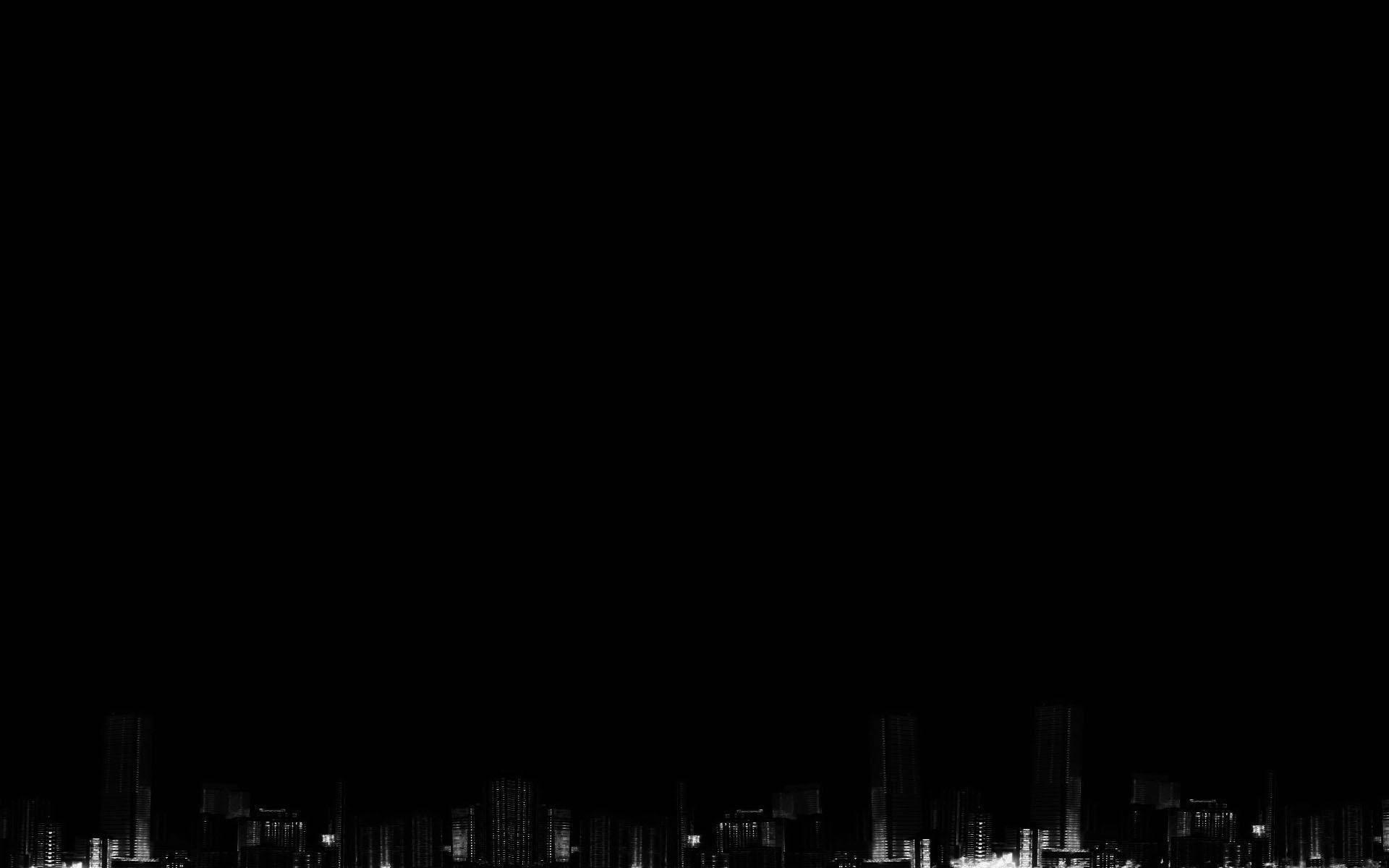 城市夜景黑調風 Tumblr 電腦壁紙 壁紙 — 以黑暗天空為背景，點亮摩天大樓的極簡黑白城市夜景。