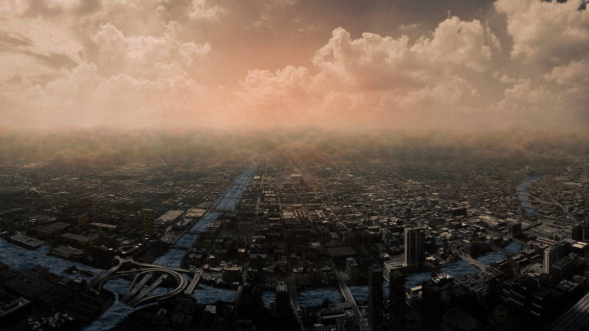 黃昏時分城市的鳥瞰圖，帶有橙色雲彩和黑暗建築物。