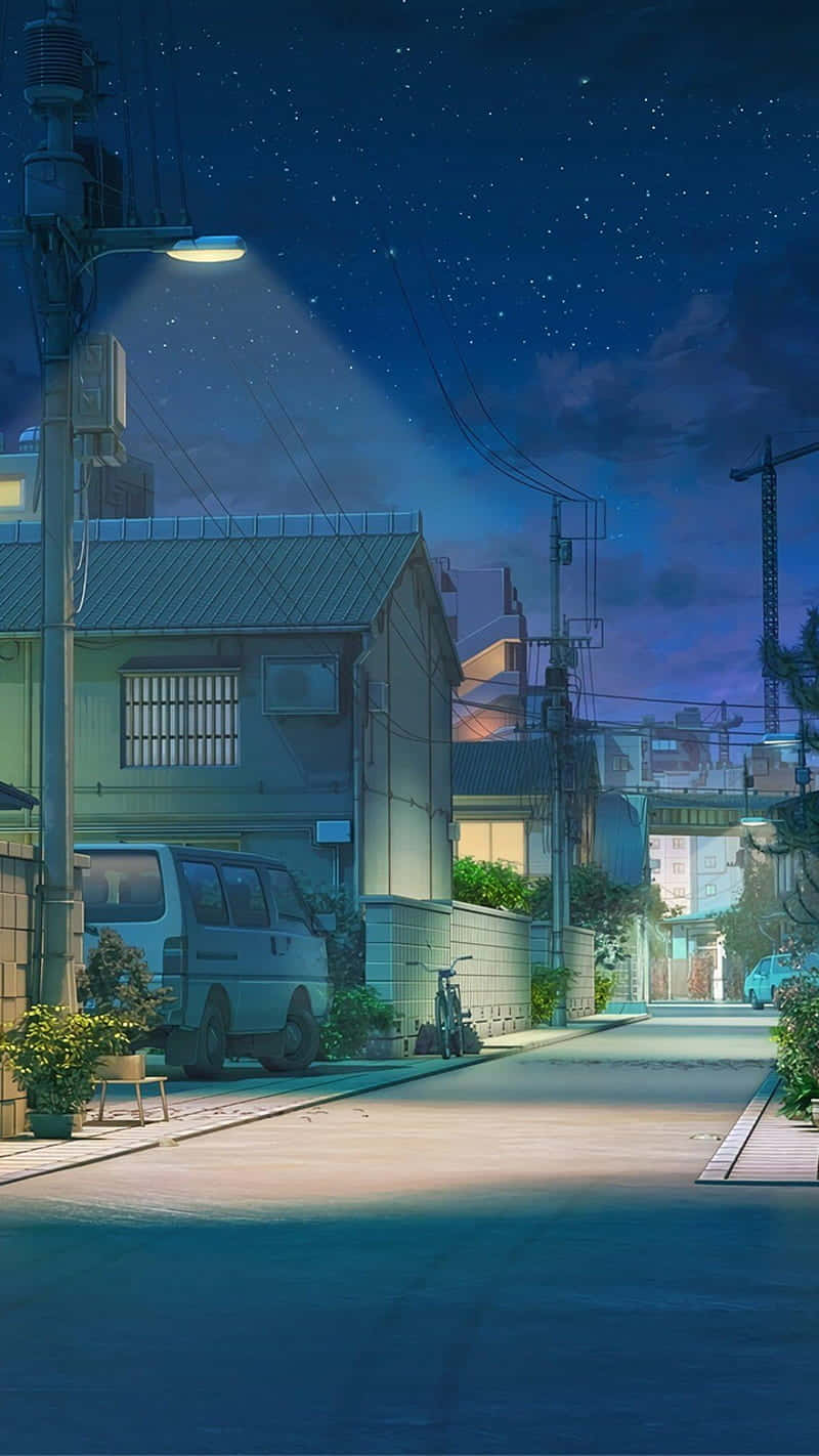 一條寧靜的日本住宅街道在夜晚星空下，街燈投射出光芒。