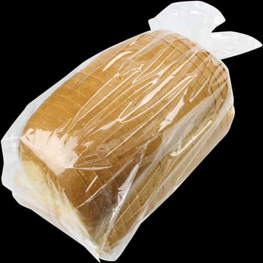 塑膠袋裝切片白麵包 壁紙 — 一條金黃色的麵包用透明塑膠包裝，襯在純黑背景上。