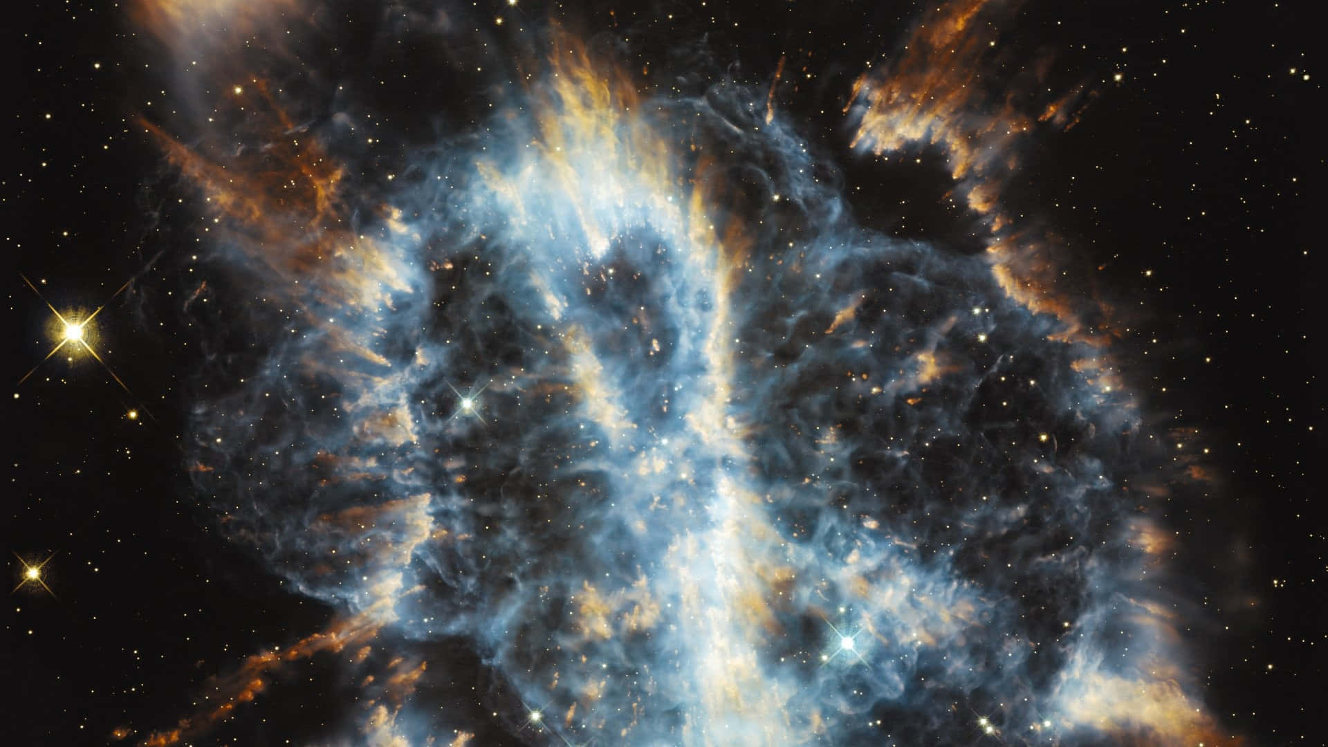 「壯觀的星系鄰域」 壁紙 — 一個充滿活力的宇宙星雲，在黑暗虛空中由明亮恆星照亮的旋轉藍色和橙色氣體。