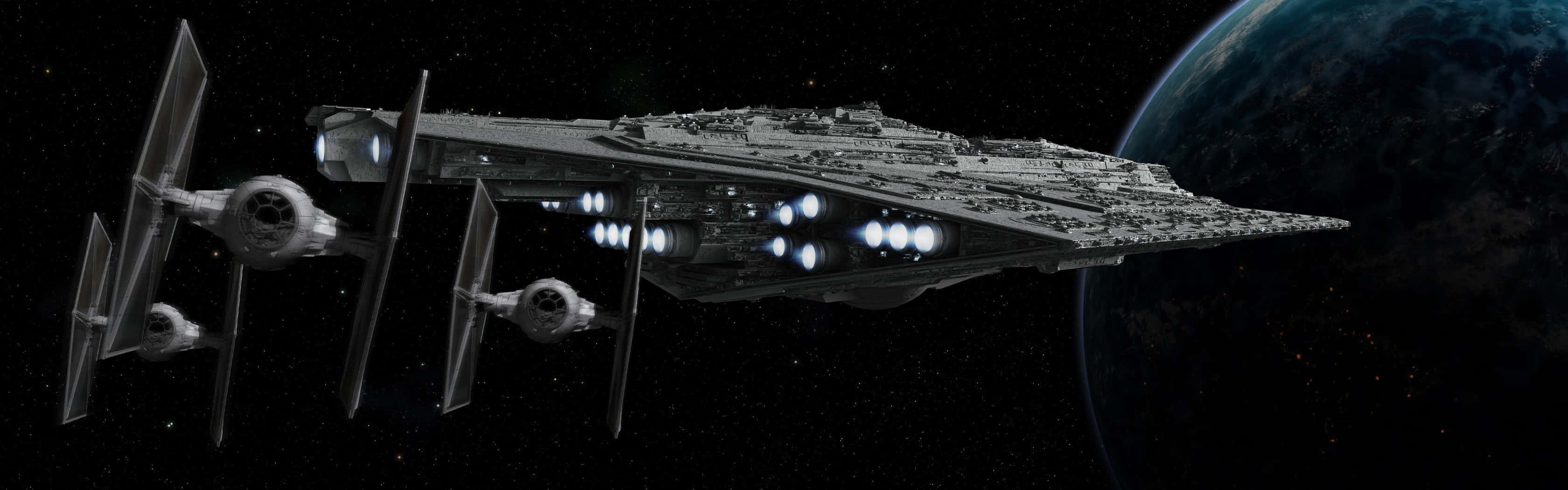 星際驅逐艦和TIE戰鬥機在太空中靠近藍色星球飛行。