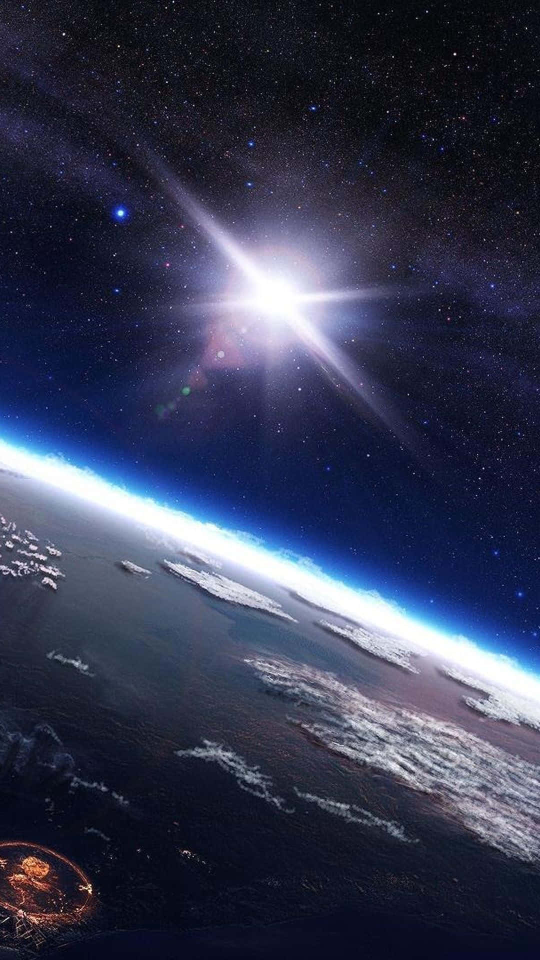 從太空看到的地球，明亮的星爆陽光在地平線上閃耀。