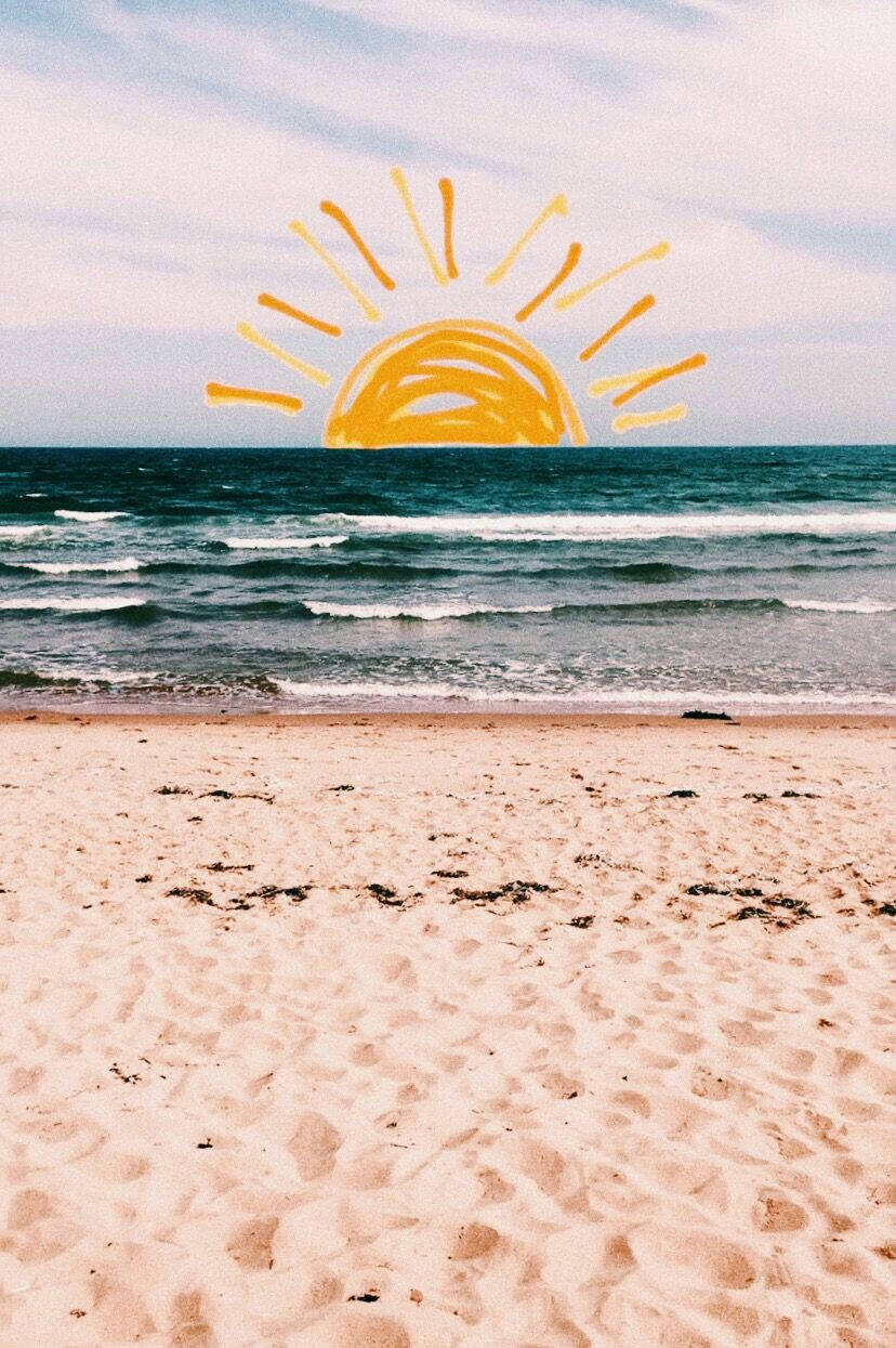 沙灘上海洋波浪上方的手繪太陽