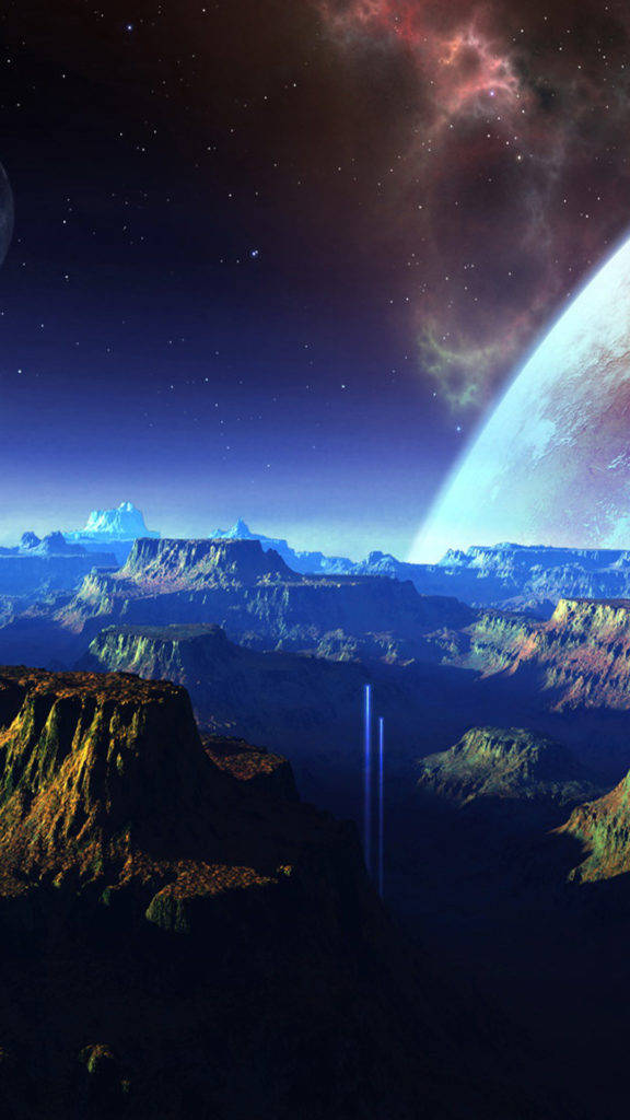 外太空山脈手機壁紙 壁紙 — 廣闊的外星峽谷，星空下有一顆發光的行星和星雲。