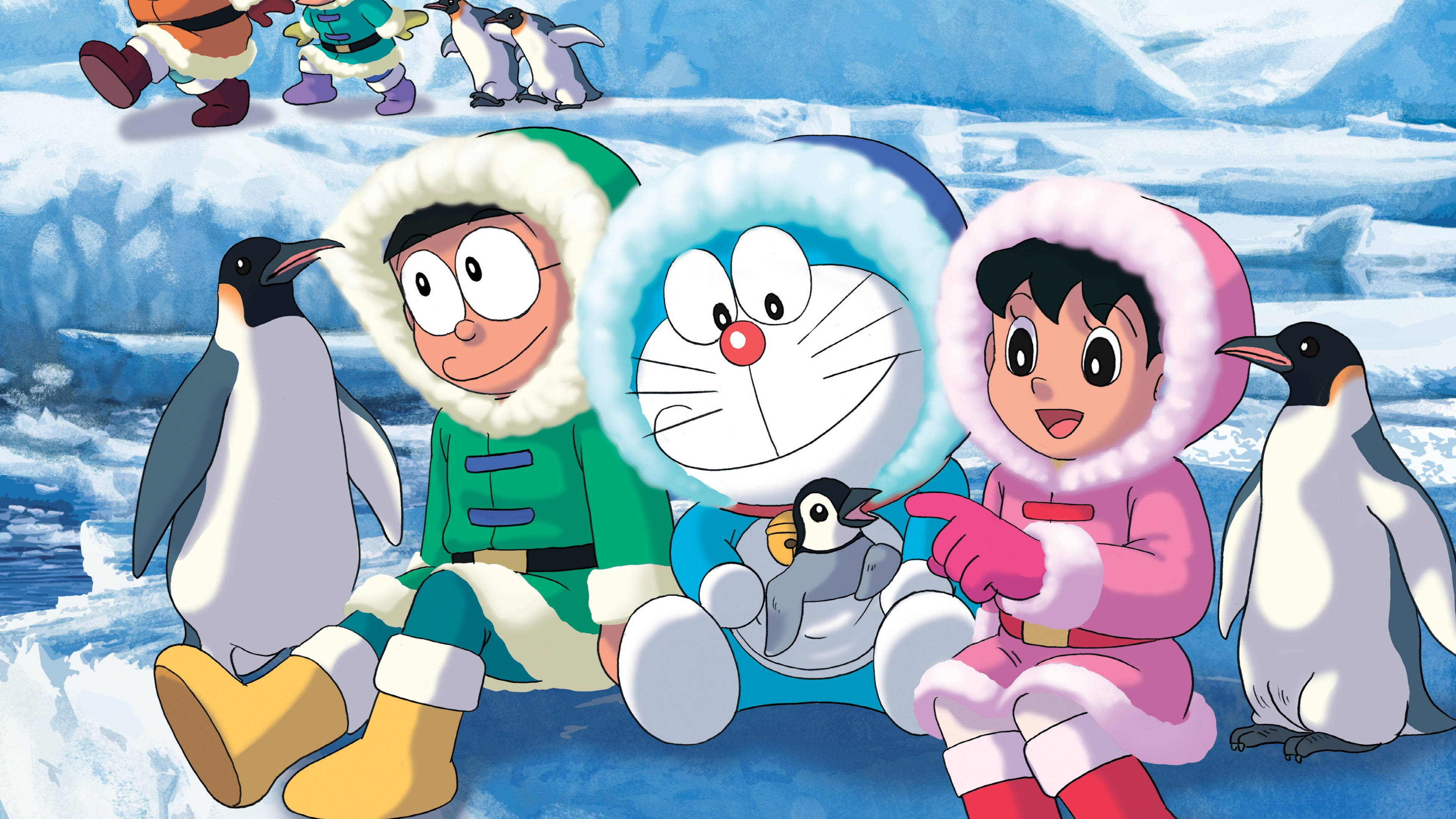 doraemon 4K 桌布 壁紙 — 多啦A夢和朋友們穿著冬季裝備，在冰天雪地上與企鵝一起坐在明亮的藍天下。