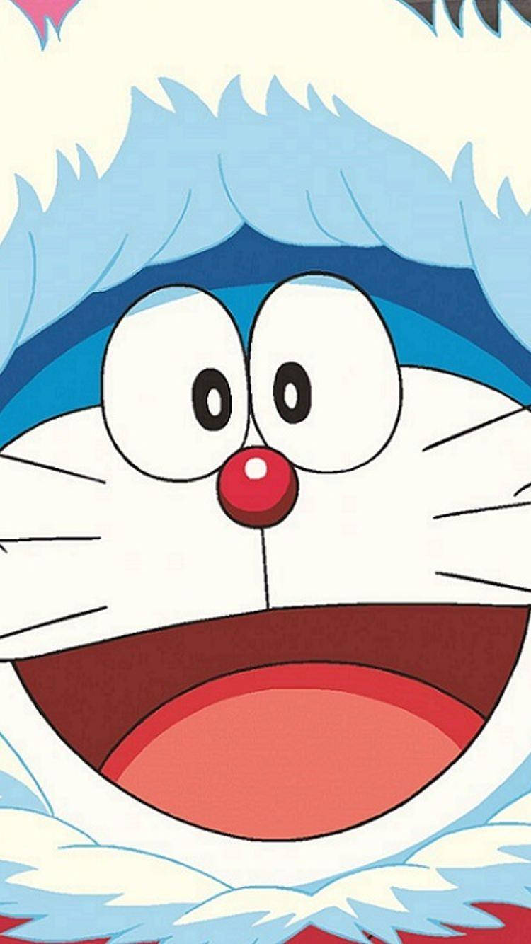 Doraemon 桌布 壁紙 — 多啦A夢開心嘅大頭近鏡，眼仔碌碌，藍色鬆毛同紅色鼻哥，襯住軟綿綿嘅忌廉色背景。