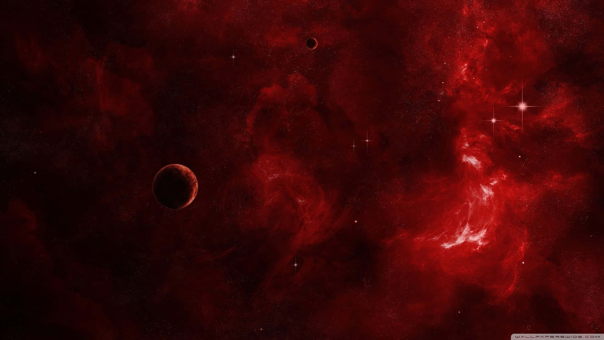 深空中帶有閃爍星星和行星的紅色星雲