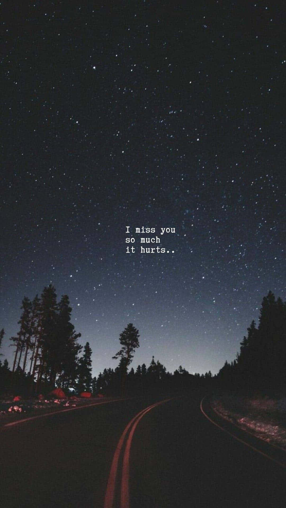 hurt 桌布 壁紙 — 夜晚星空下蜿蜒的道路，帶有表達思念的文字疊加。
