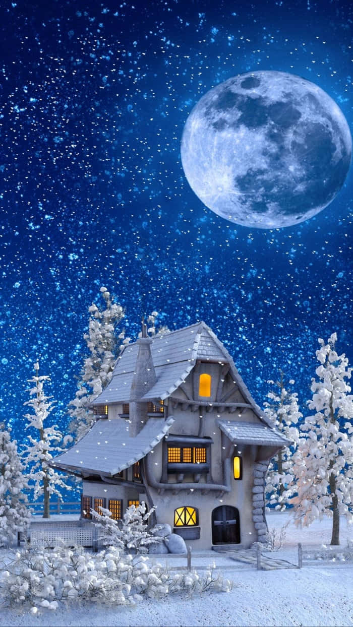 夜月村莊屋舍畫作 壁紙 — 一間舒適的雪覆蓋小屋在滿天星斗的冬夜天空下，於一輪巨大的月亮下溫暖地發光。
