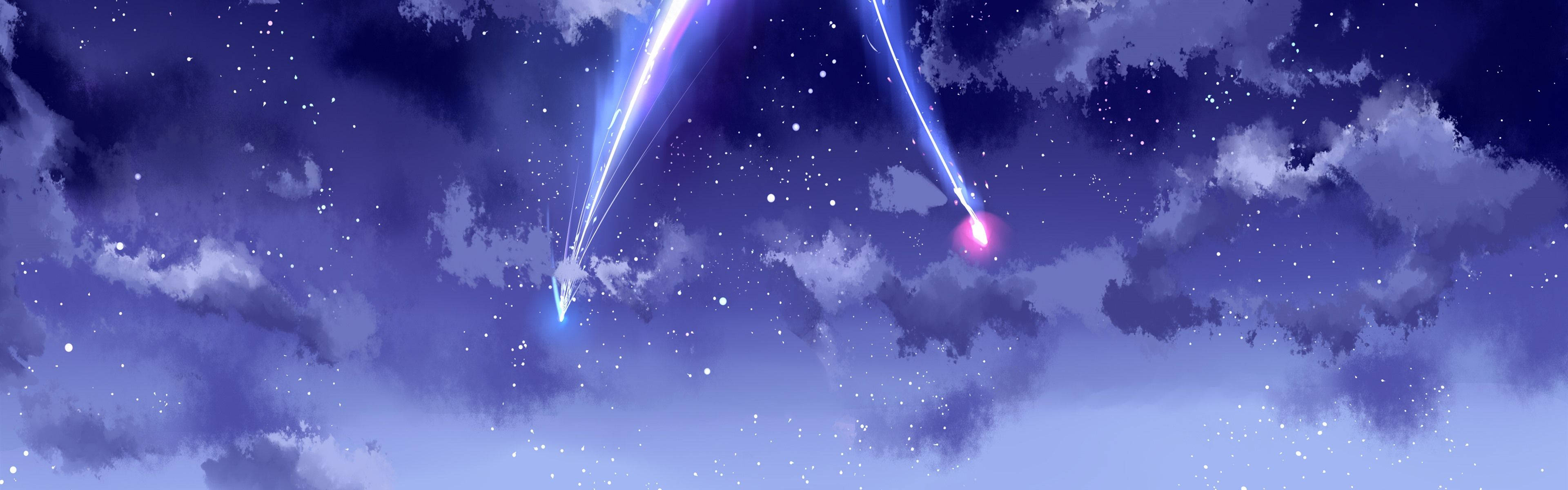 兩顆發光的流星劃過星空紫色天空，伴有柔和的雲彩。